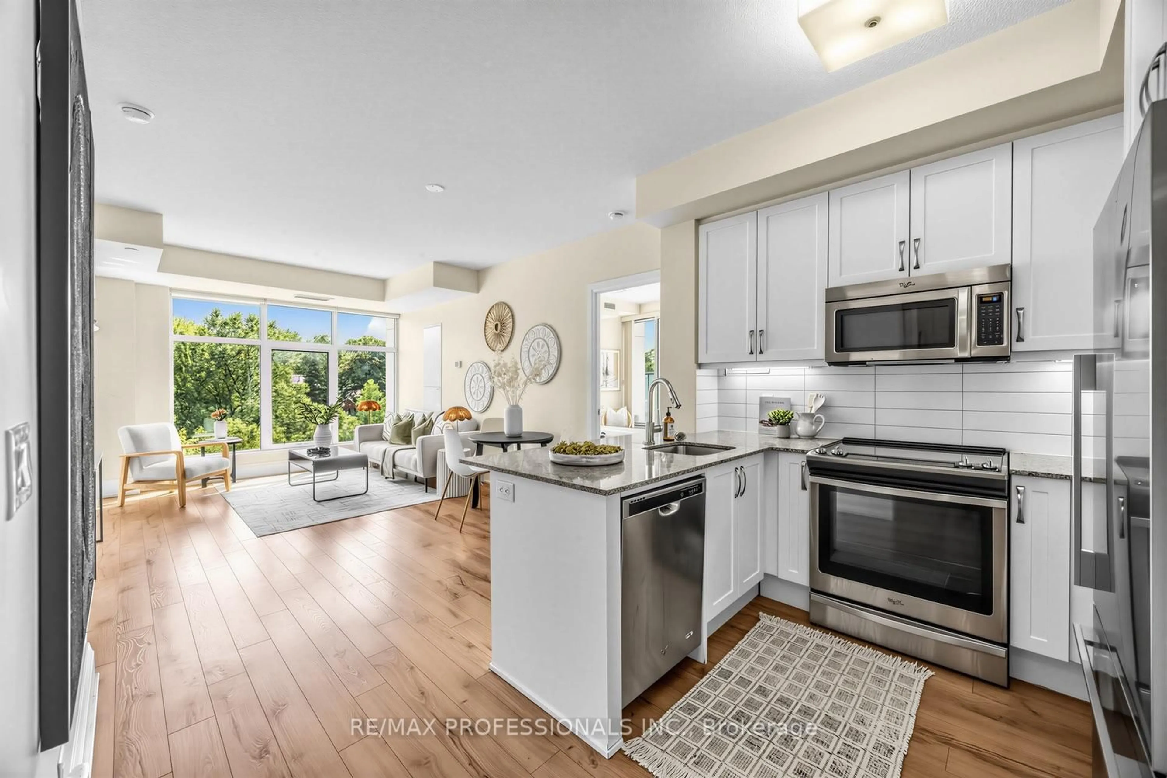 Open concept kitchen, ceramic/tile floor for 2 Old Mill Dr #417, Toronto Ontario M6S 0A2