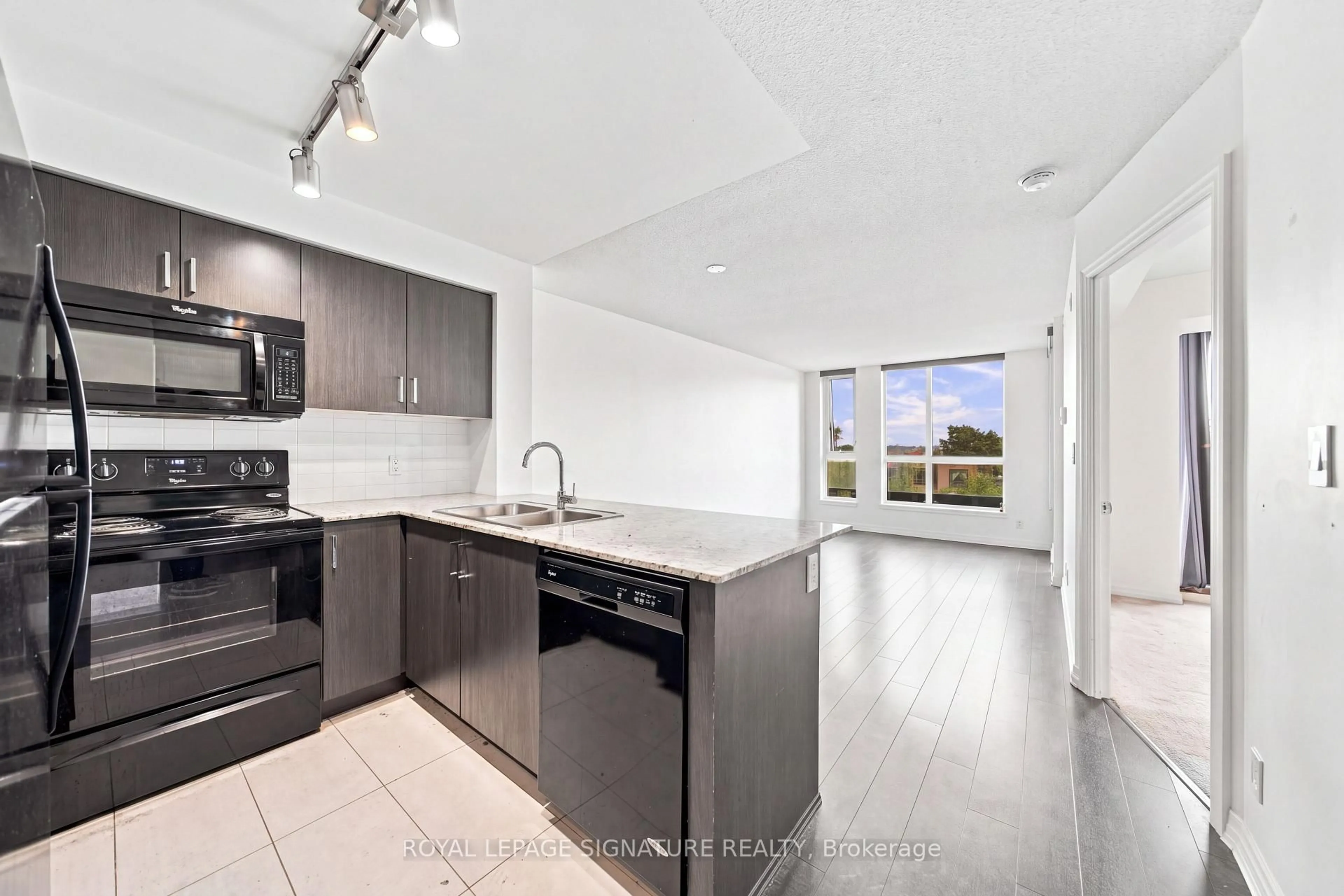 Open concept kitchen, unknown for 80 Esther Lorrie Dr #417, Toronto Ontario M9W 0C6