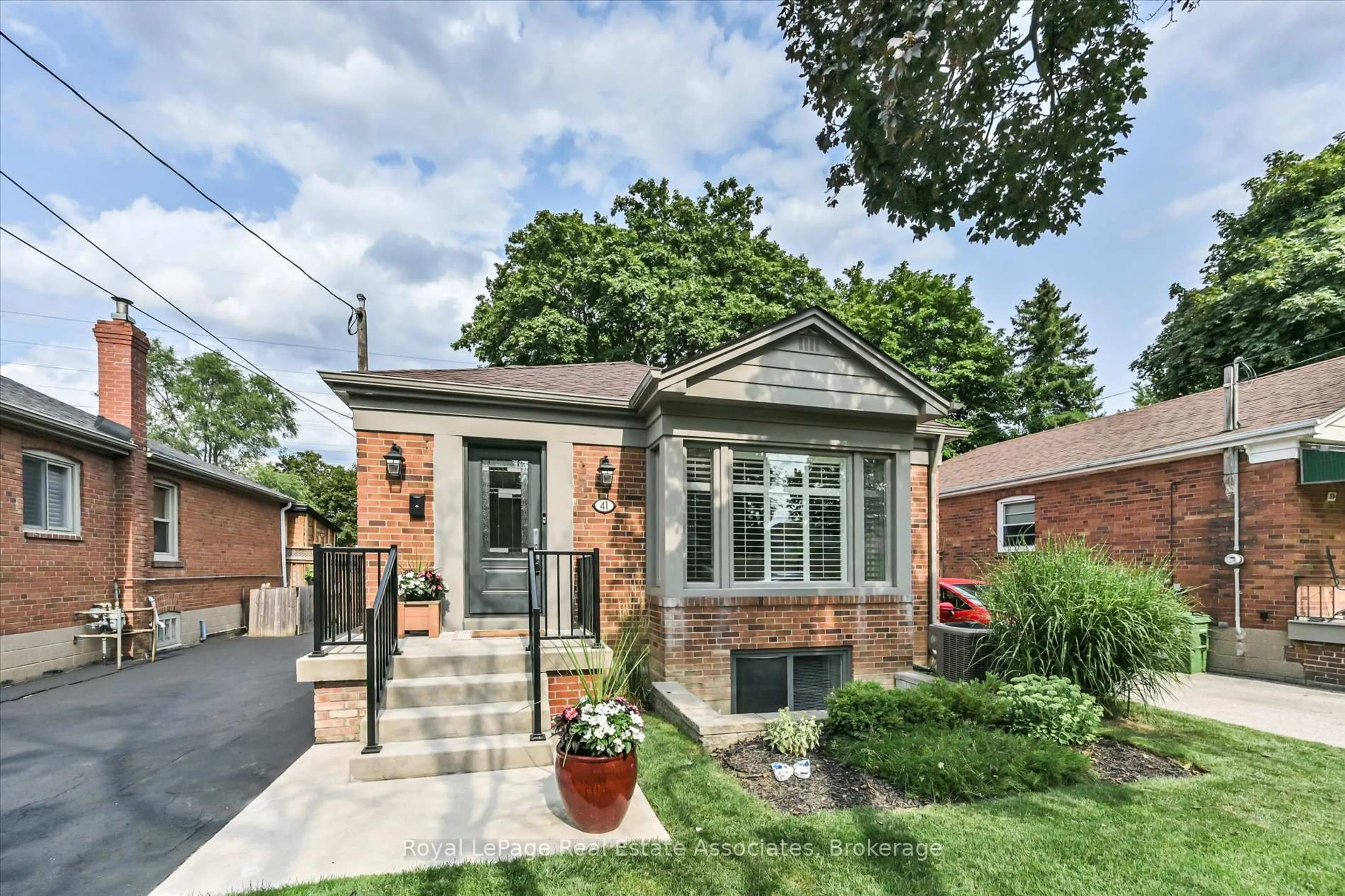 Home with brick exterior material, street for 41 Ashbourne Dr, Toronto Ontario M9B 4H3