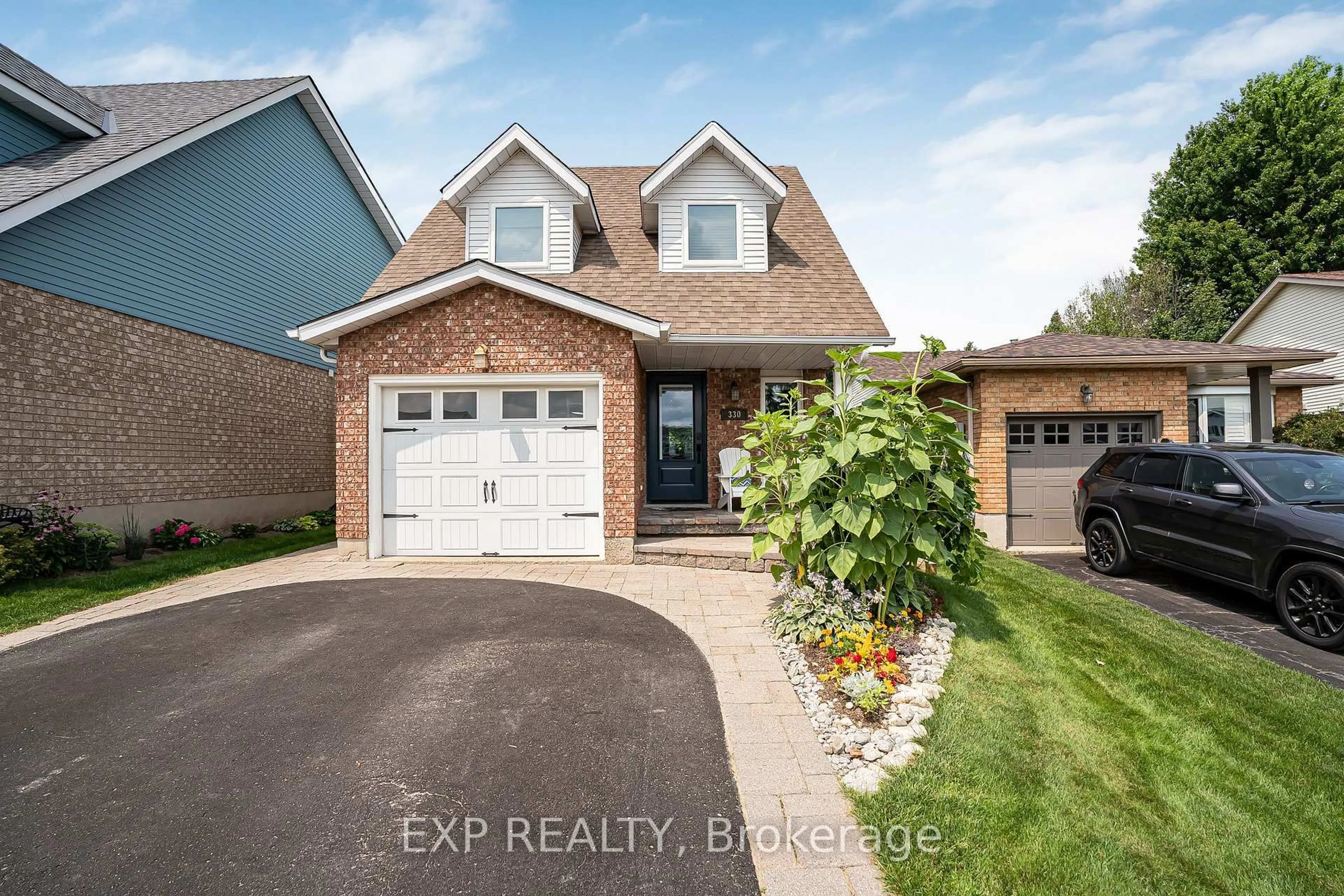 Home with brick exterior material, street for 330 Adams Crt, Orangeville Ontario L9W 4R7