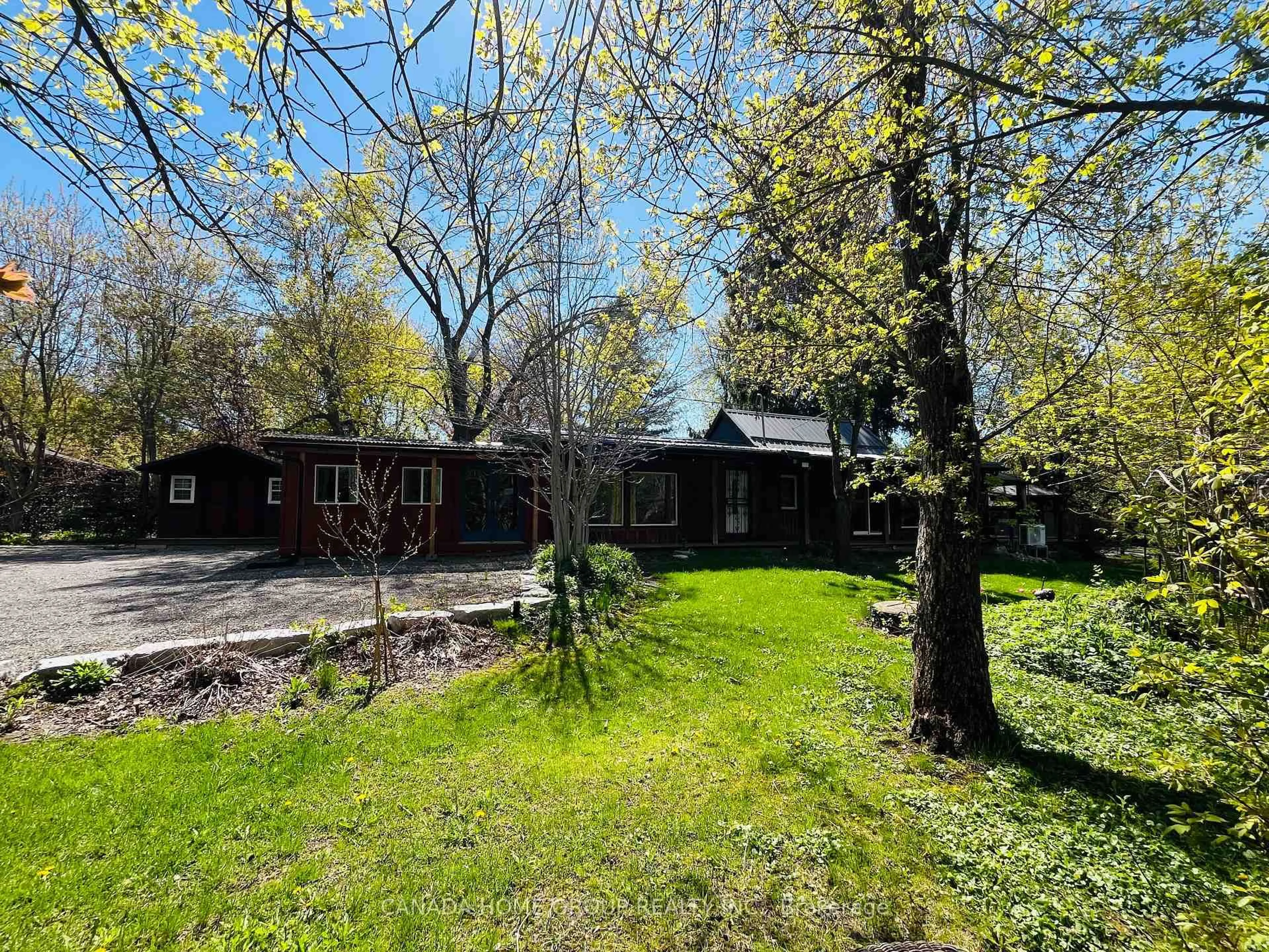 A pic from outside/outdoor area/front of a property/back of a property/a pic from drone, forest/trees view for 15472 Mclaughlin Rd, Caledon Ontario L7C 1J5