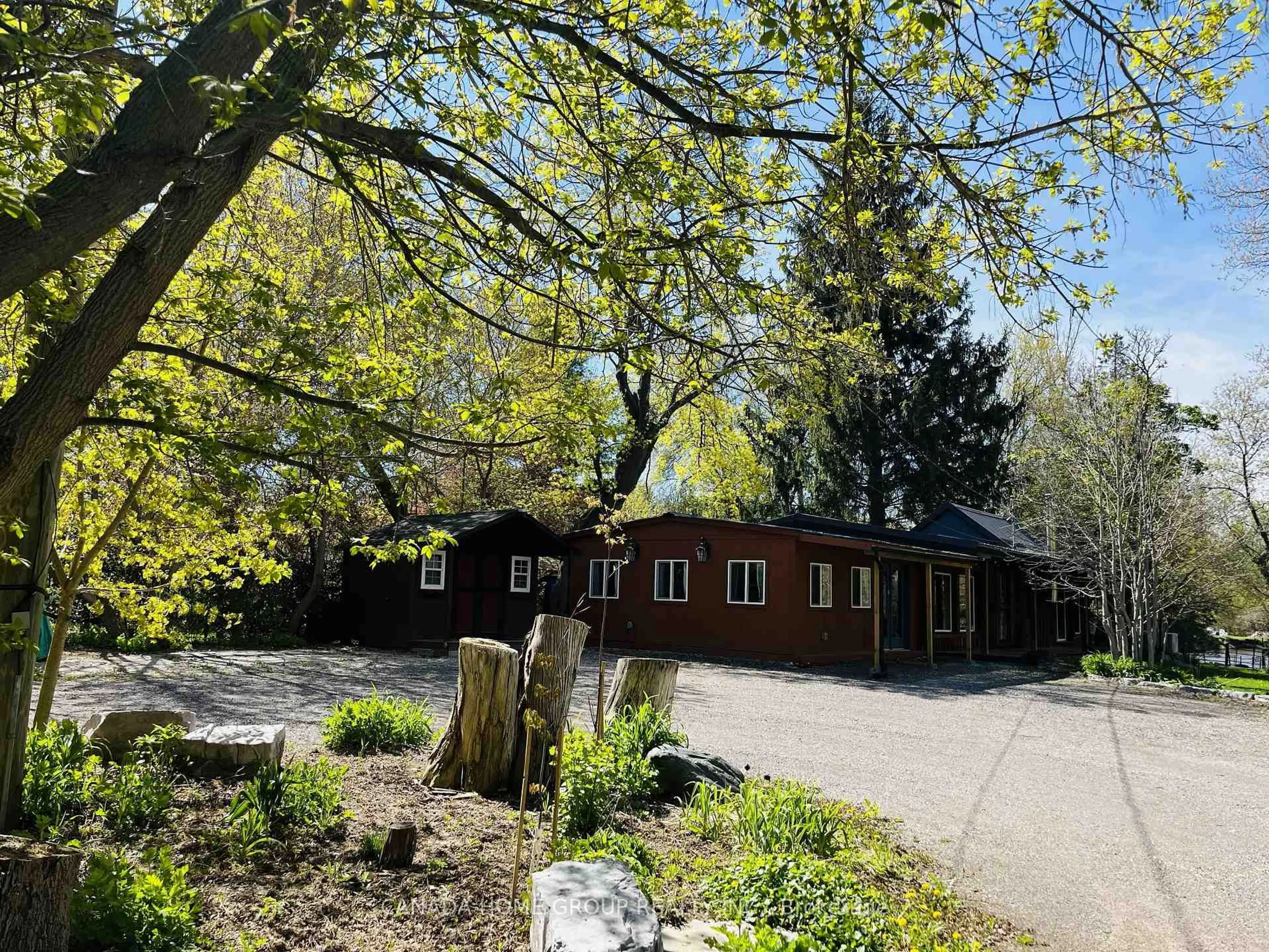 A pic from outside/outdoor area/front of a property/back of a property/a pic from drone, forest/trees view for 15472 Mclaughlin Rd, Caledon Ontario L7C 1J5