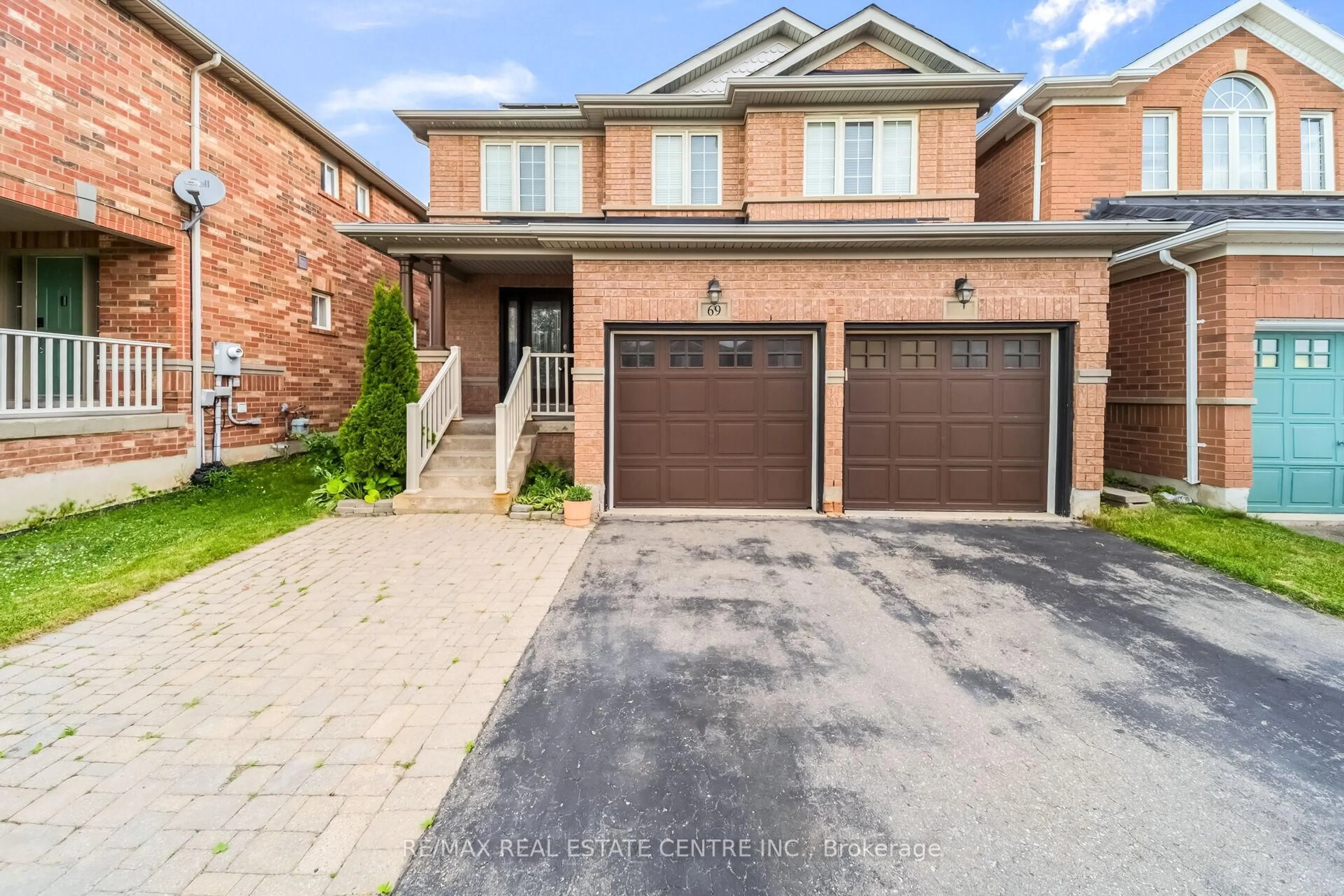 Home with brick exterior material, street for 69 Crown Victoria Dr, Brampton Ontario L7A 3X1