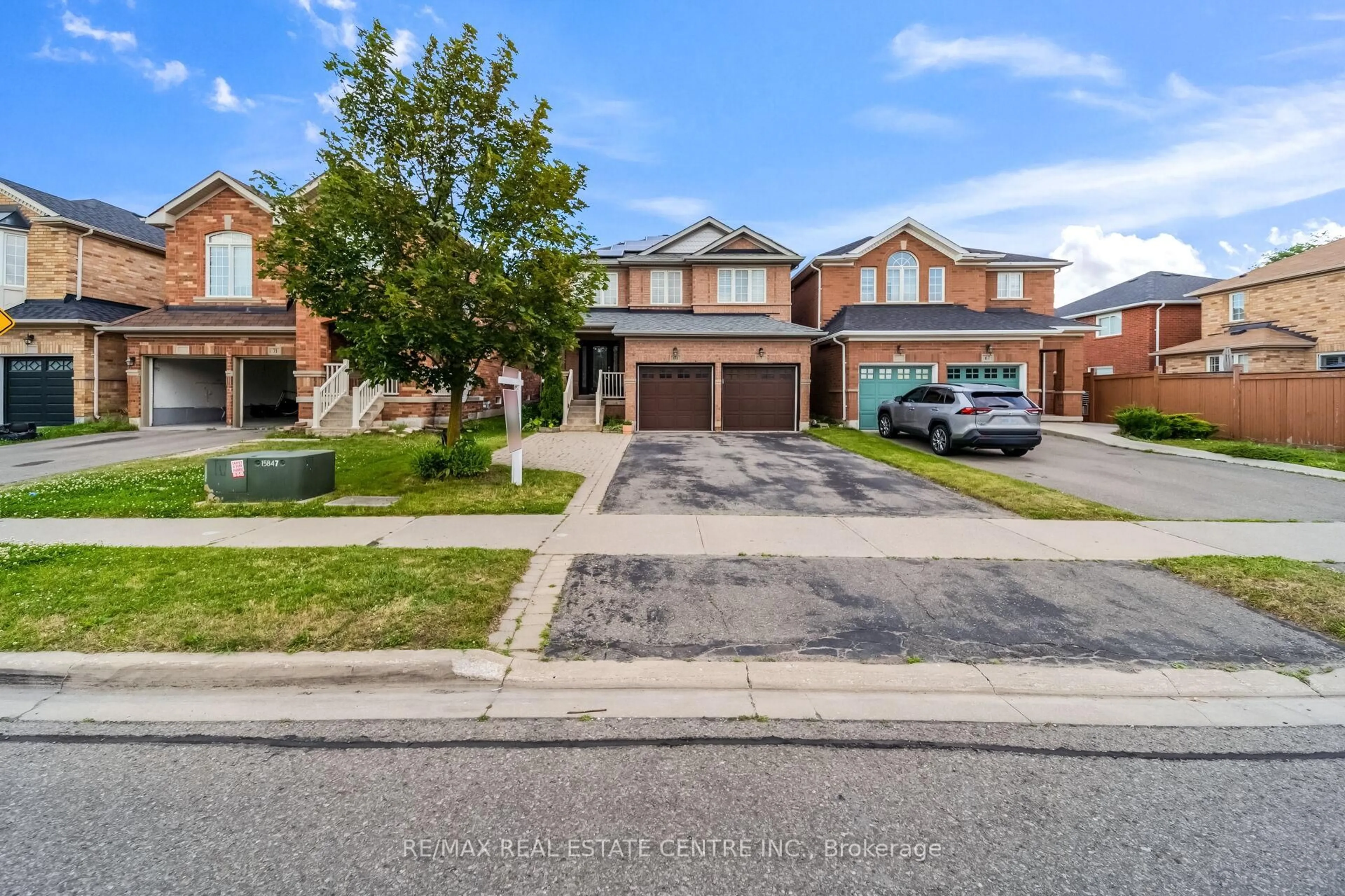 Home with brick exterior material, street for 69 Crown Victoria Dr, Brampton Ontario L7A 3X1
