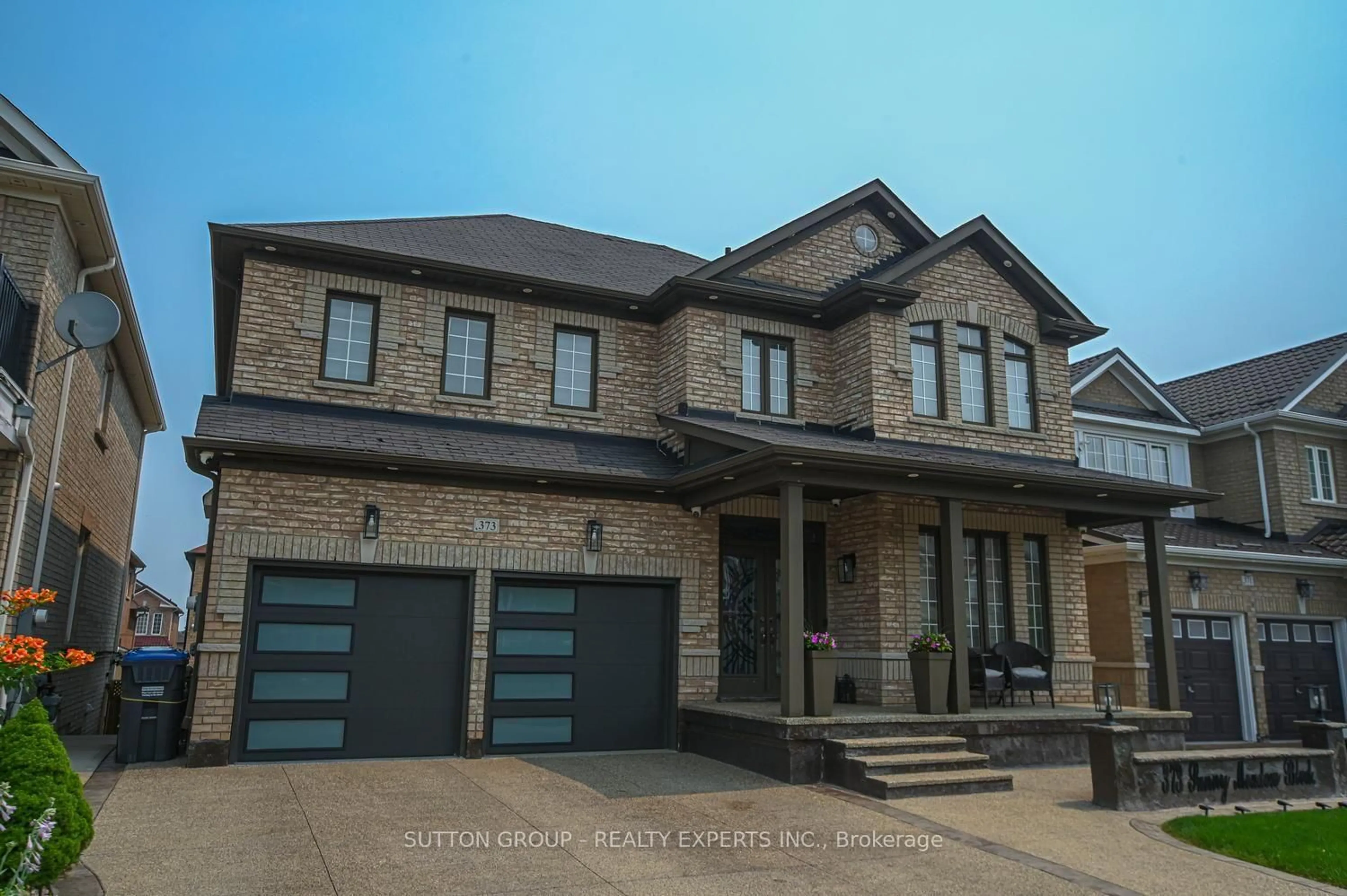 Home with brick exterior material, street for 373 Sunny Meadow Blvd, Brampton Ontario L6R 0G2