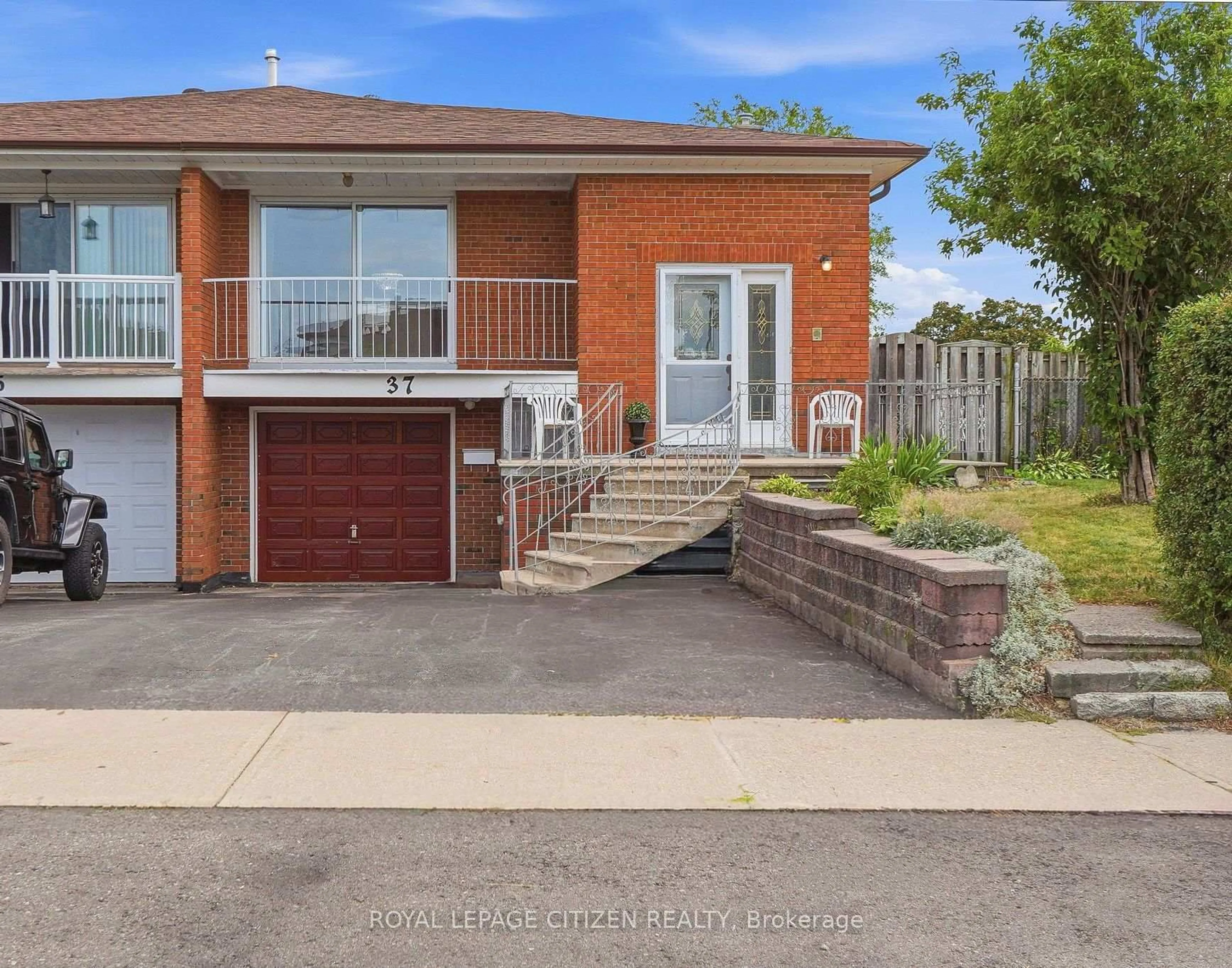 Home with brick exterior material, street for 37 Firenza Dr, Toronto Ontario M9L 1A4