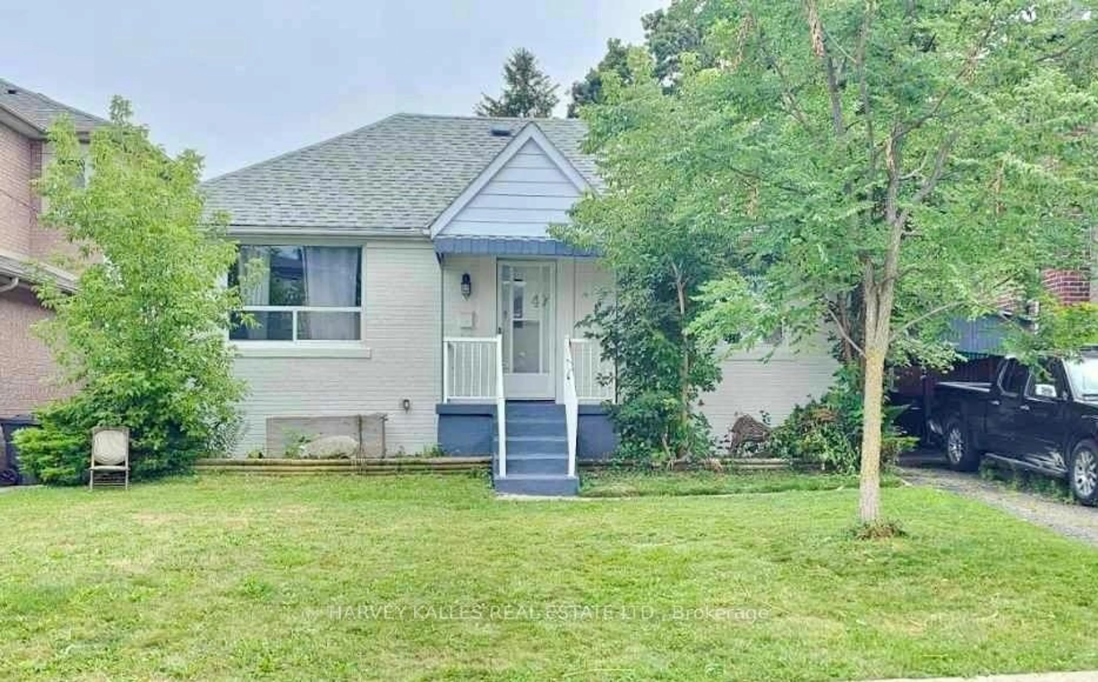 Home with vinyl exterior material, street for 47 Stayner Ave, Toronto Ontario M6B 1N5