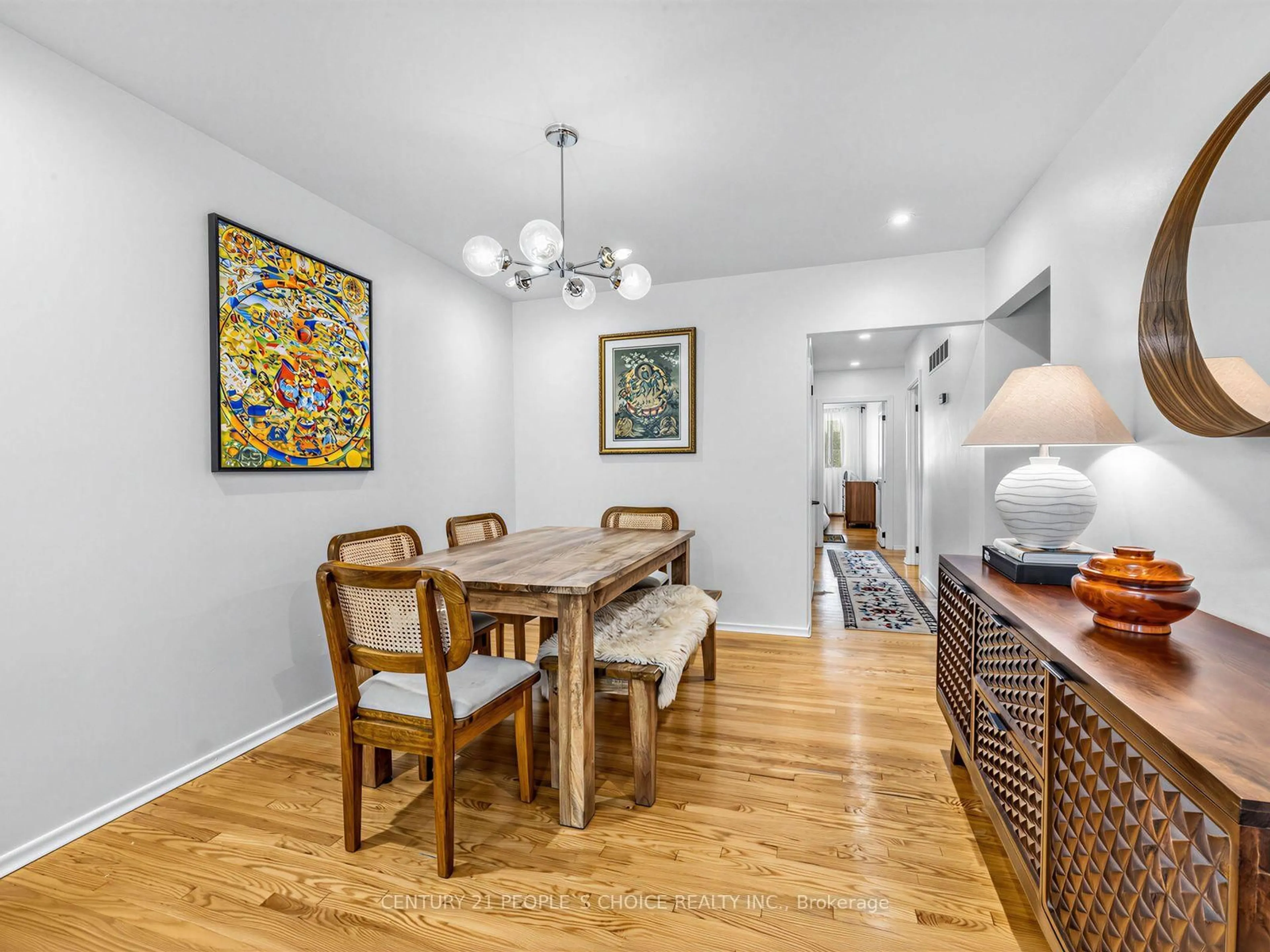 Dining room, wood/laminate floor for 1465 Glen Rutley Circ, Mississauga Ontario L4X 1Z8