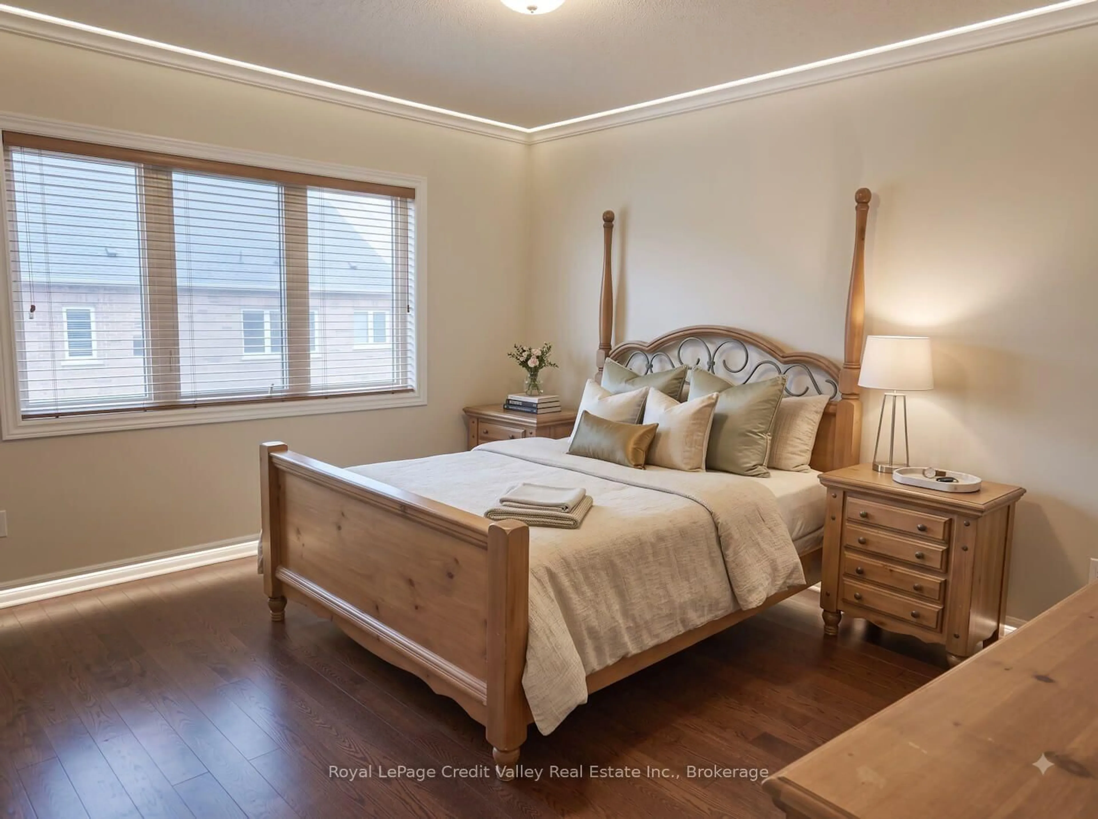 Bedroom with bed, wood/laminate floor for 53 Hogan Manor Dr, Brampton Ontario L7A 4V2