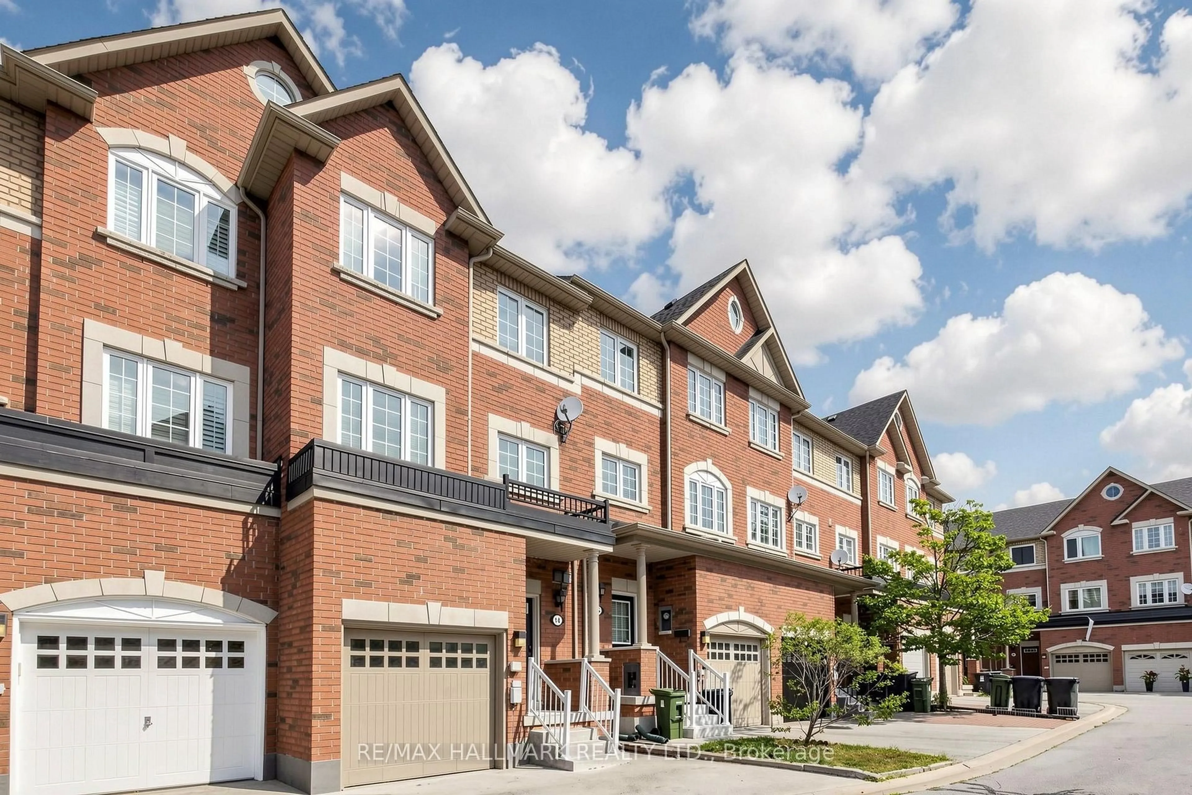 Home with brick exterior material, street for 14 Elphick Lane, Toronto Ontario M9N 4A2
