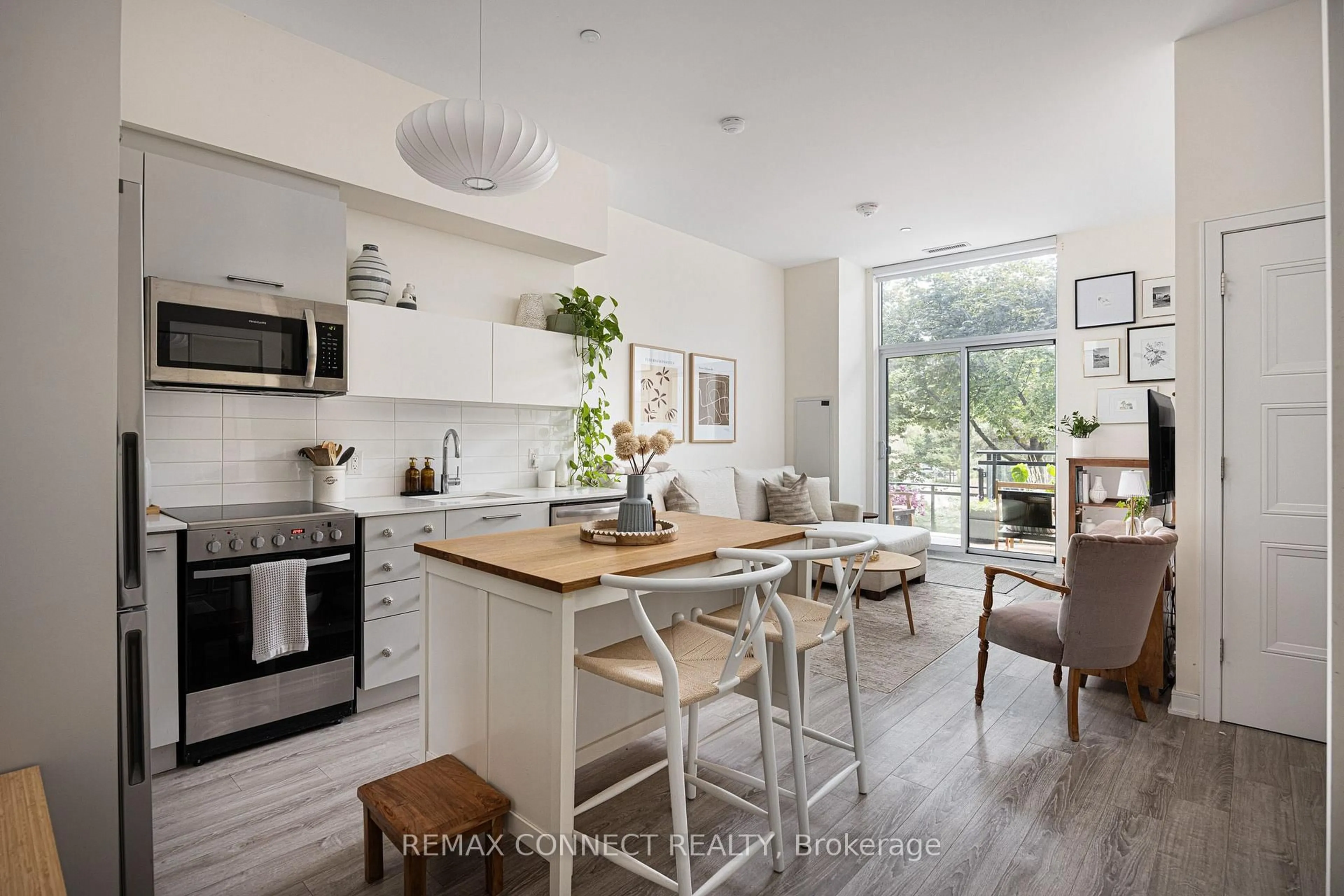 Open concept kitchen, unknown for 1 Neighbourhood Lane #107, Toronto Ontario M8Y 1T7