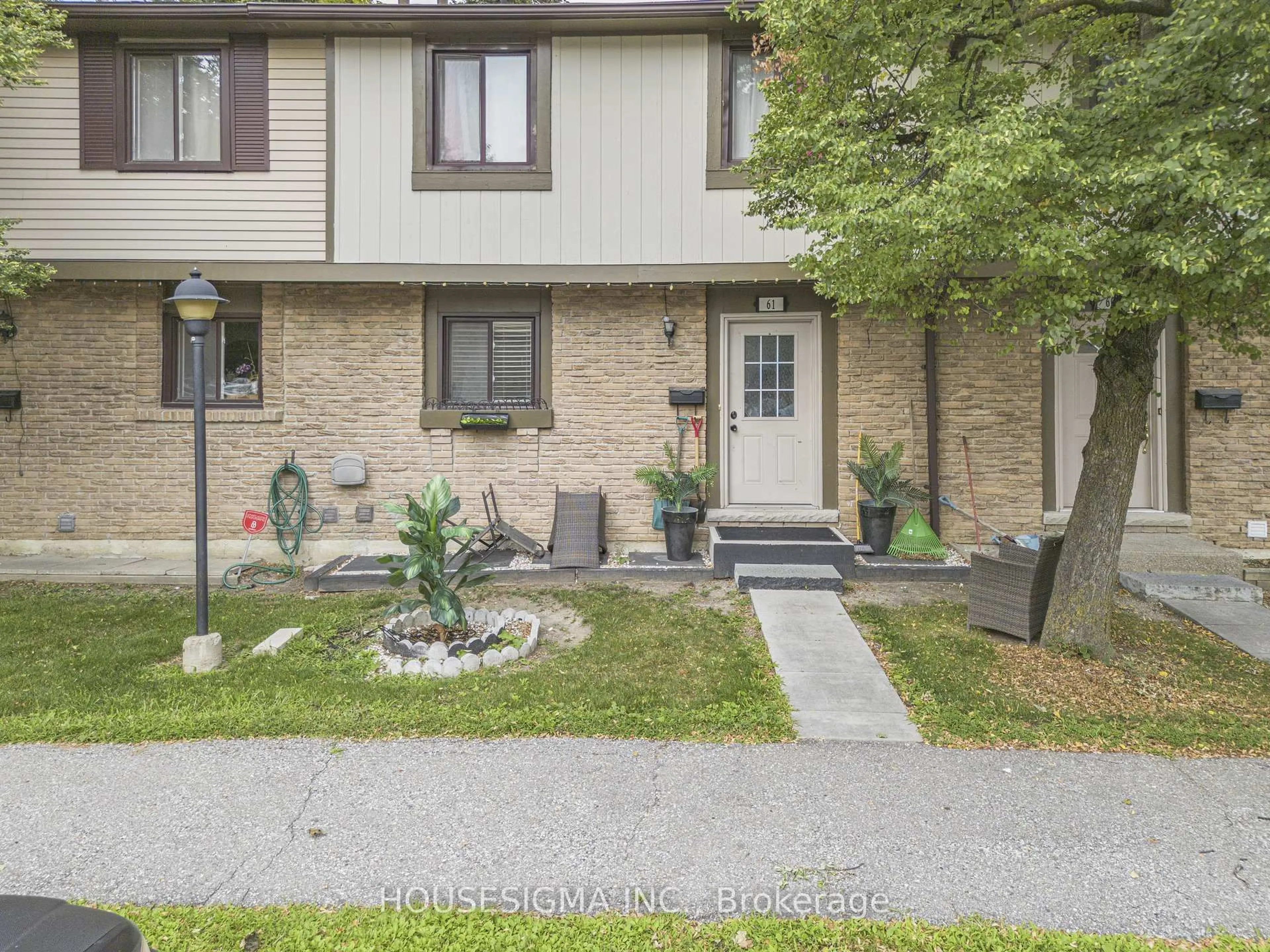A pic from outside/outdoor area/front of a property/back of a property/a pic from drone, street for 105 Hansen Rd #61, Brampton Ontario L6V 3C9