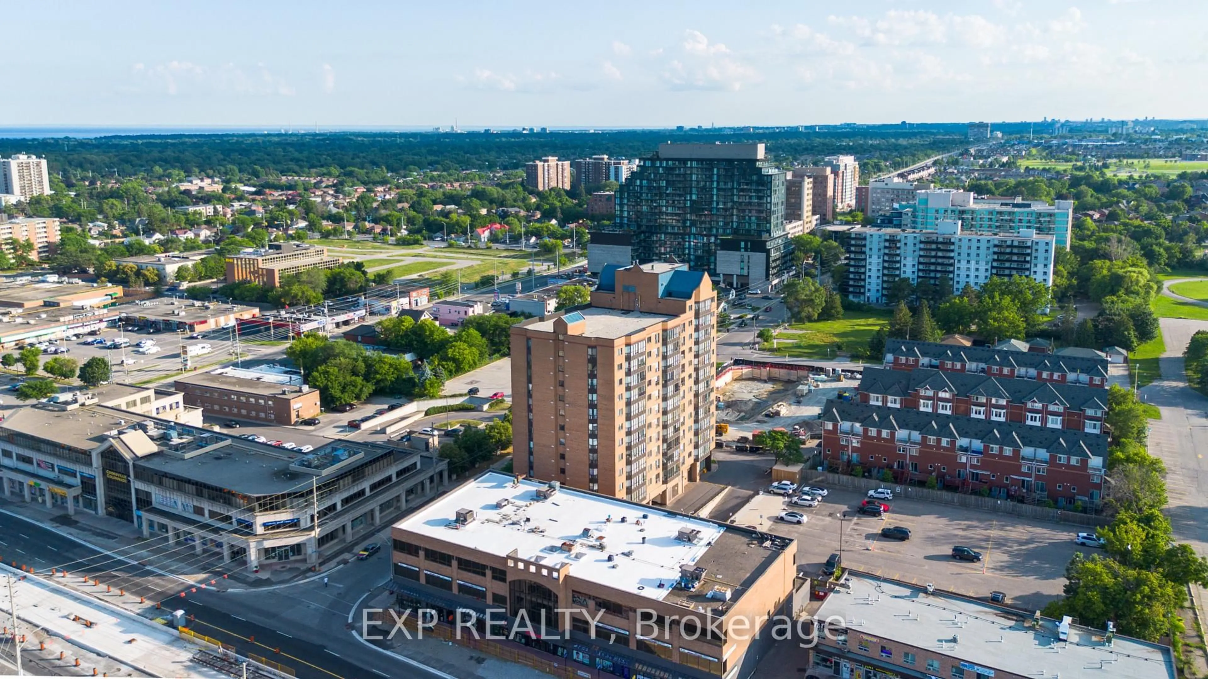 A pic from outside/outdoor area/front of a property/back of a property/a pic from drone, city buildings view from balcony for 25 Agnes St #202, Mississauga Ontario L5B 3X7