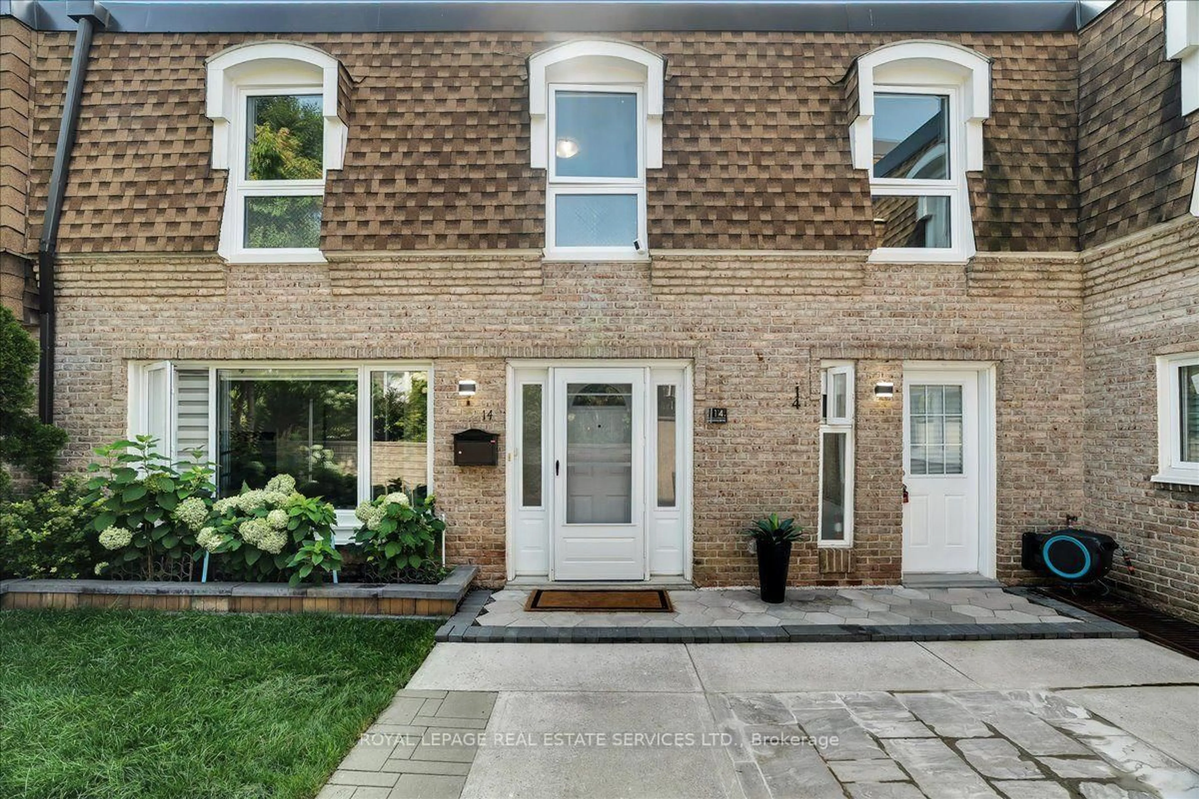 Home with brick exterior material, street for 1310 Gulleden Dr #14, Mississauga Ontario L4X 1Y9