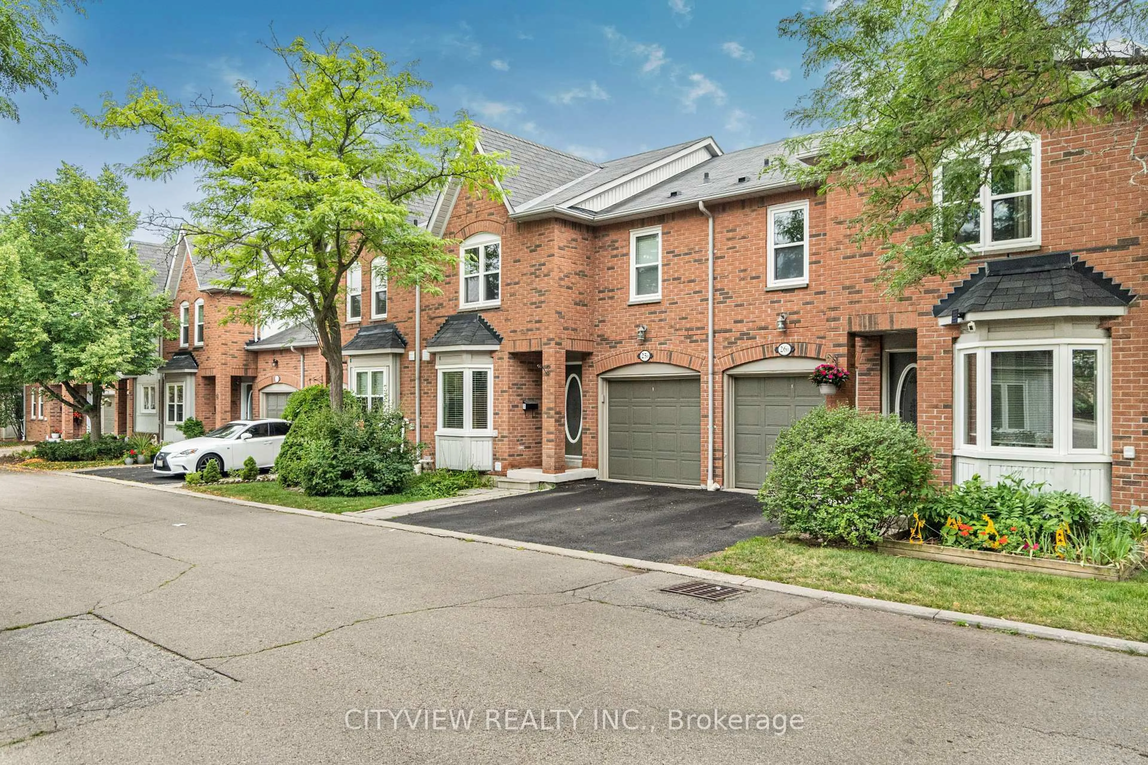 Home with brick exterior material, street for 5865 Dalebrook Cres #25B, Mississauga Ontario L5M 5W9