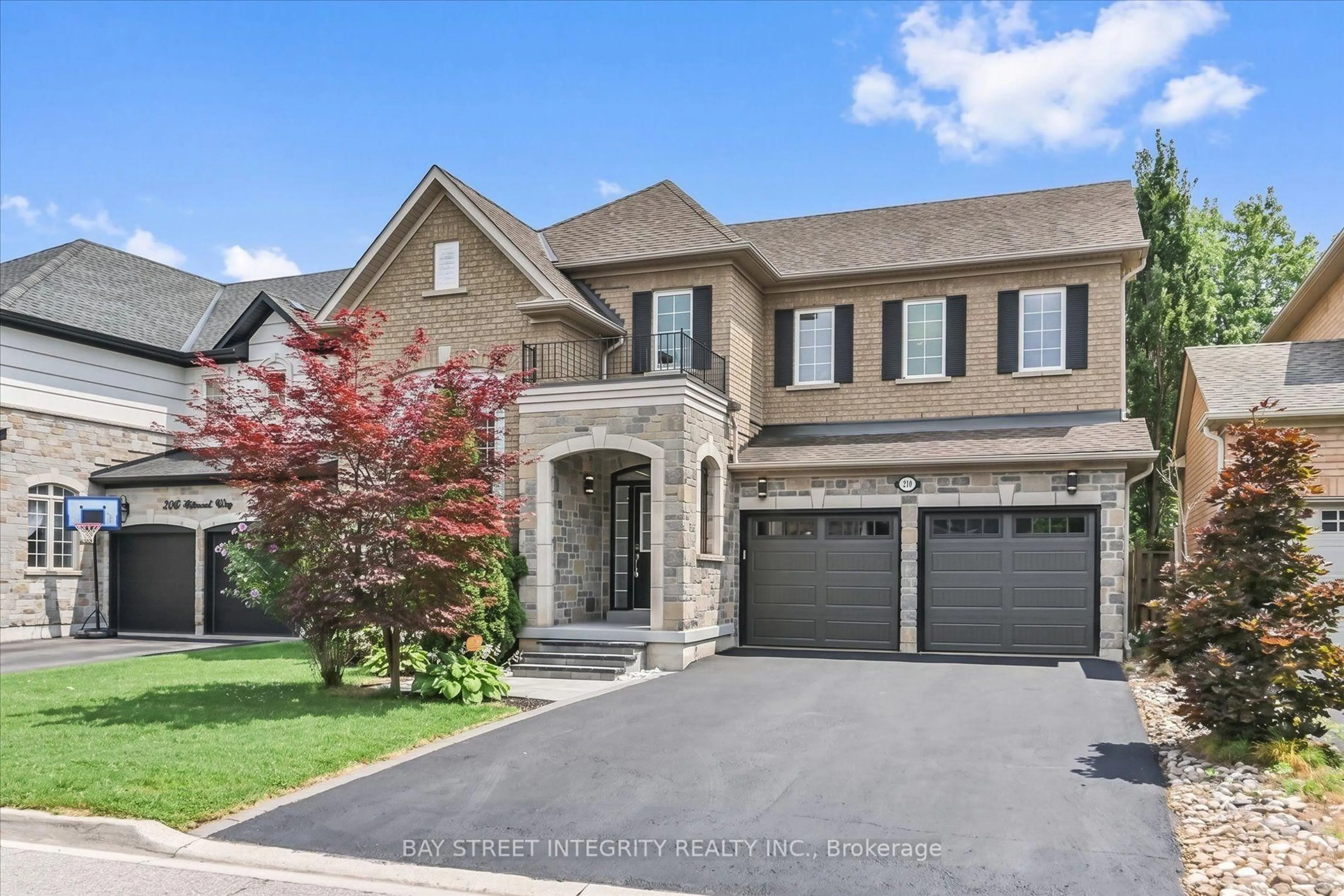 Home with brick exterior material, street for 210 Milkweed Way, Oakville Ontario L6L 0A6