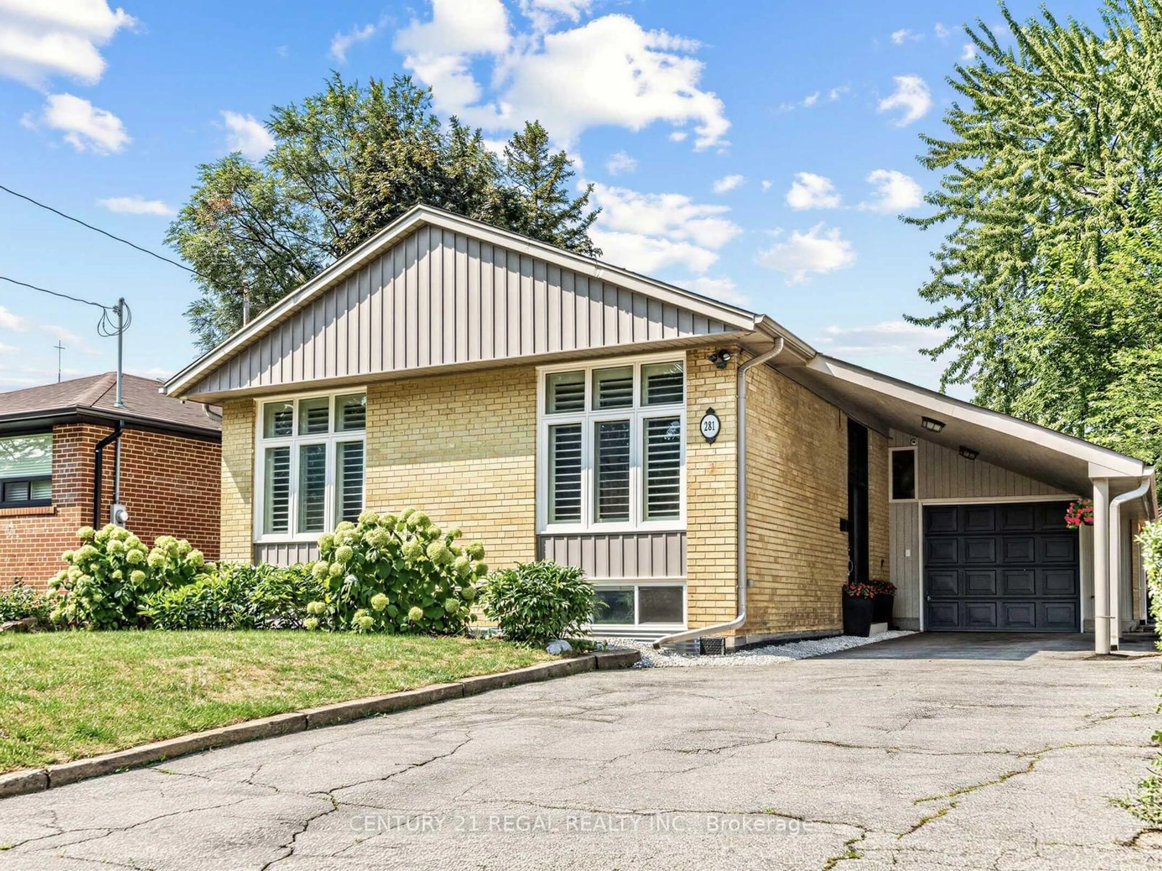 Home with brick exterior material, street for 281 Thistle Down Blvd, Toronto Ontario M9V 1K6