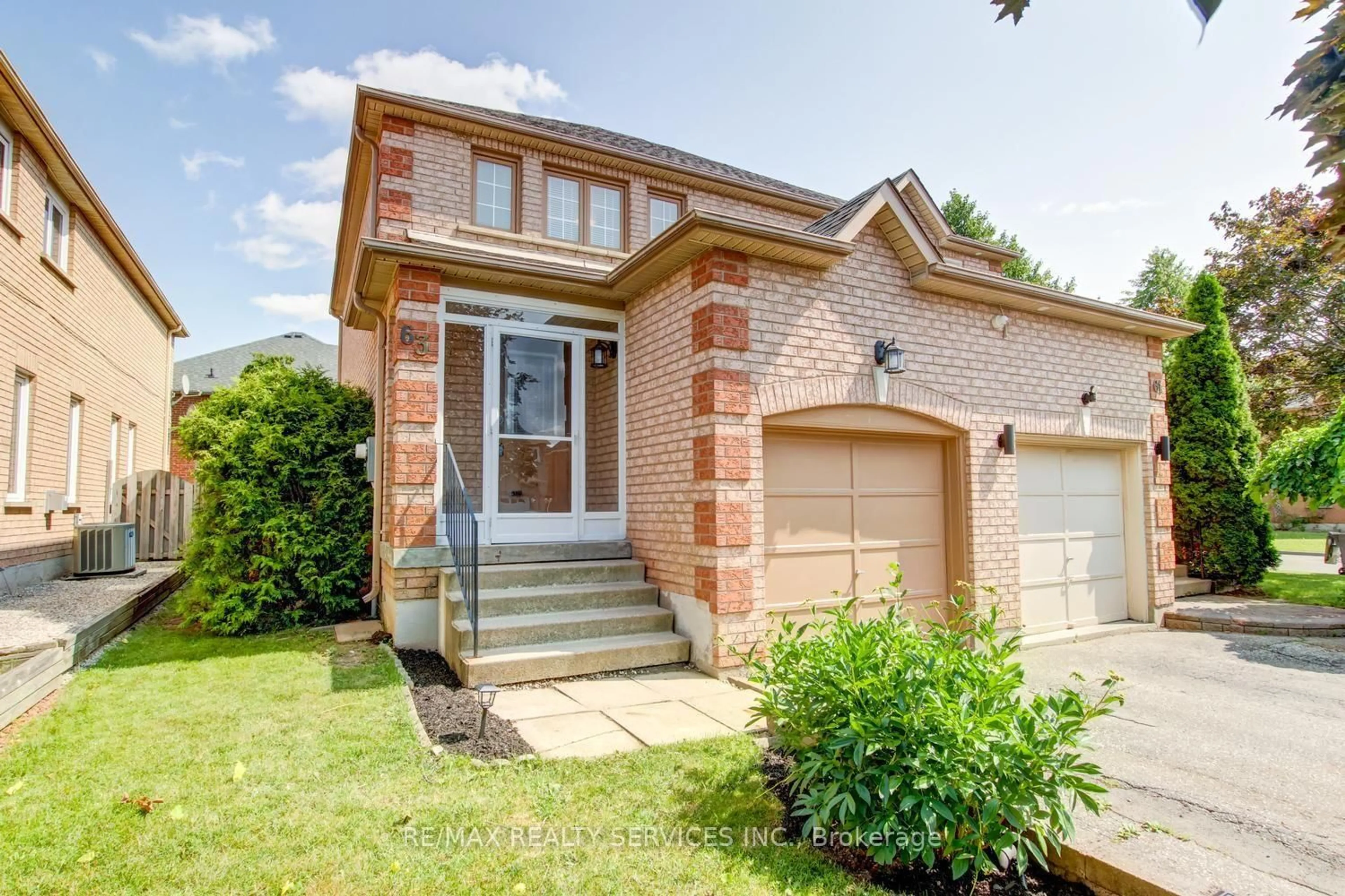 Home with brick exterior material, street for 63 Herkes Dr, Brampton Ontario L6Y 5B2