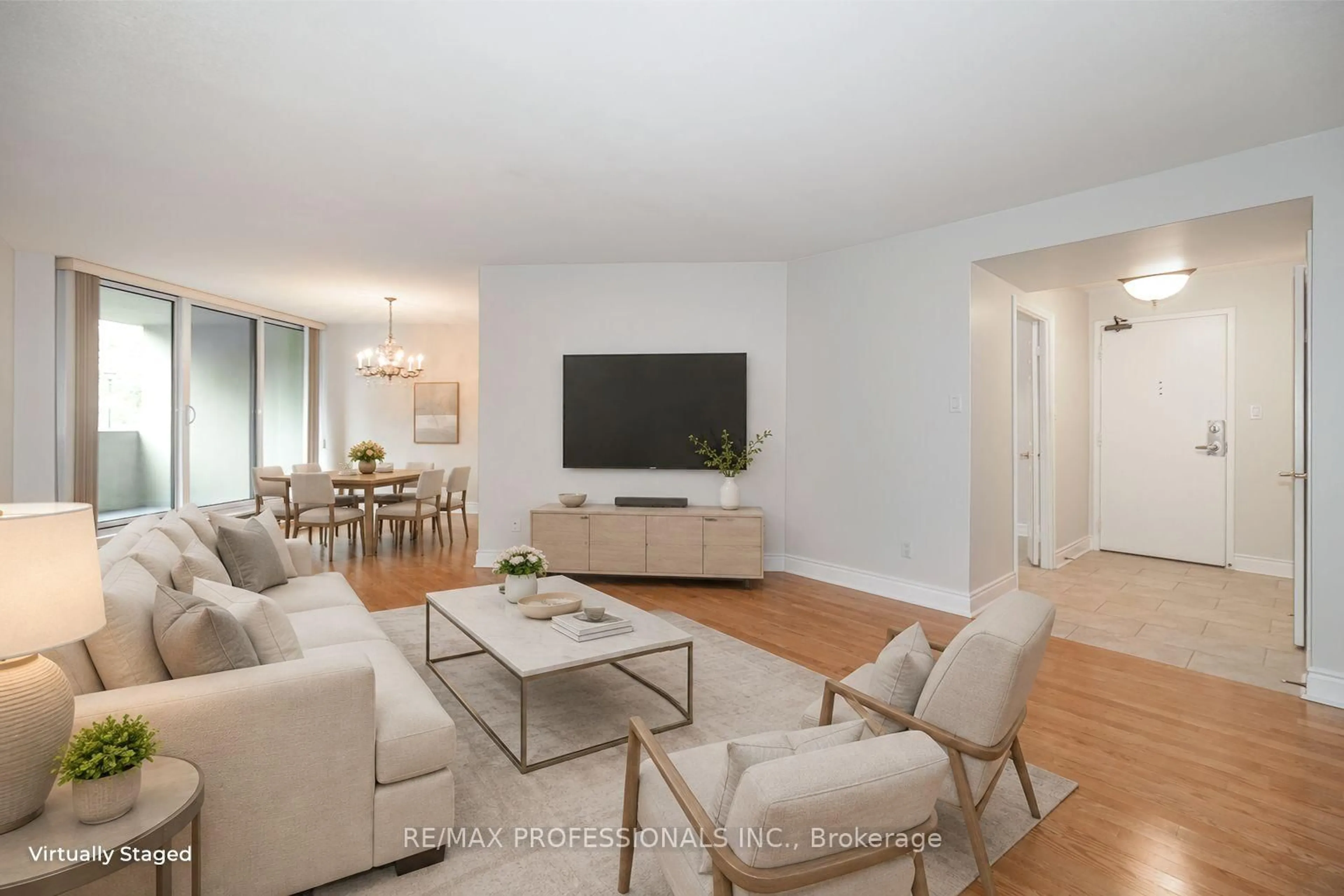 Living room with furniture, wood/laminate floor for 95 La Rose Ave #105, Toronto Ontario M9P 3T2