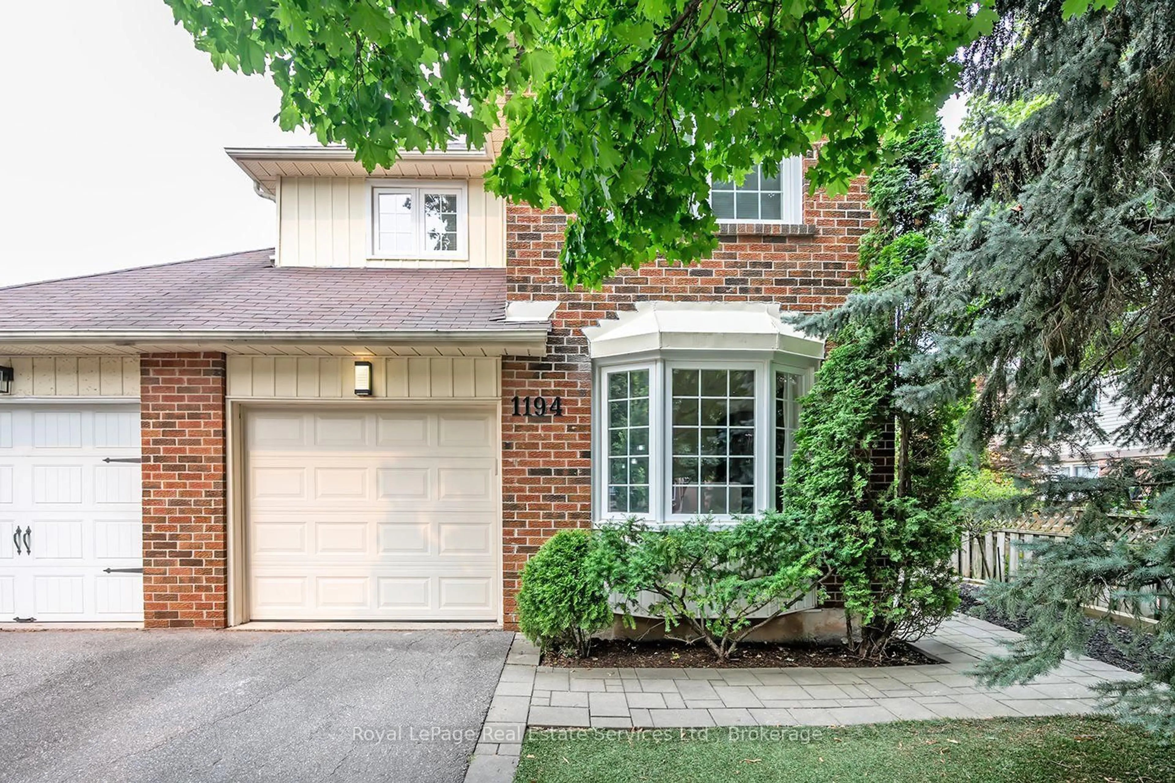 Home with brick exterior material, street for 1194 Potters Wheel Cres, Oakville Ontario L6M 1J2