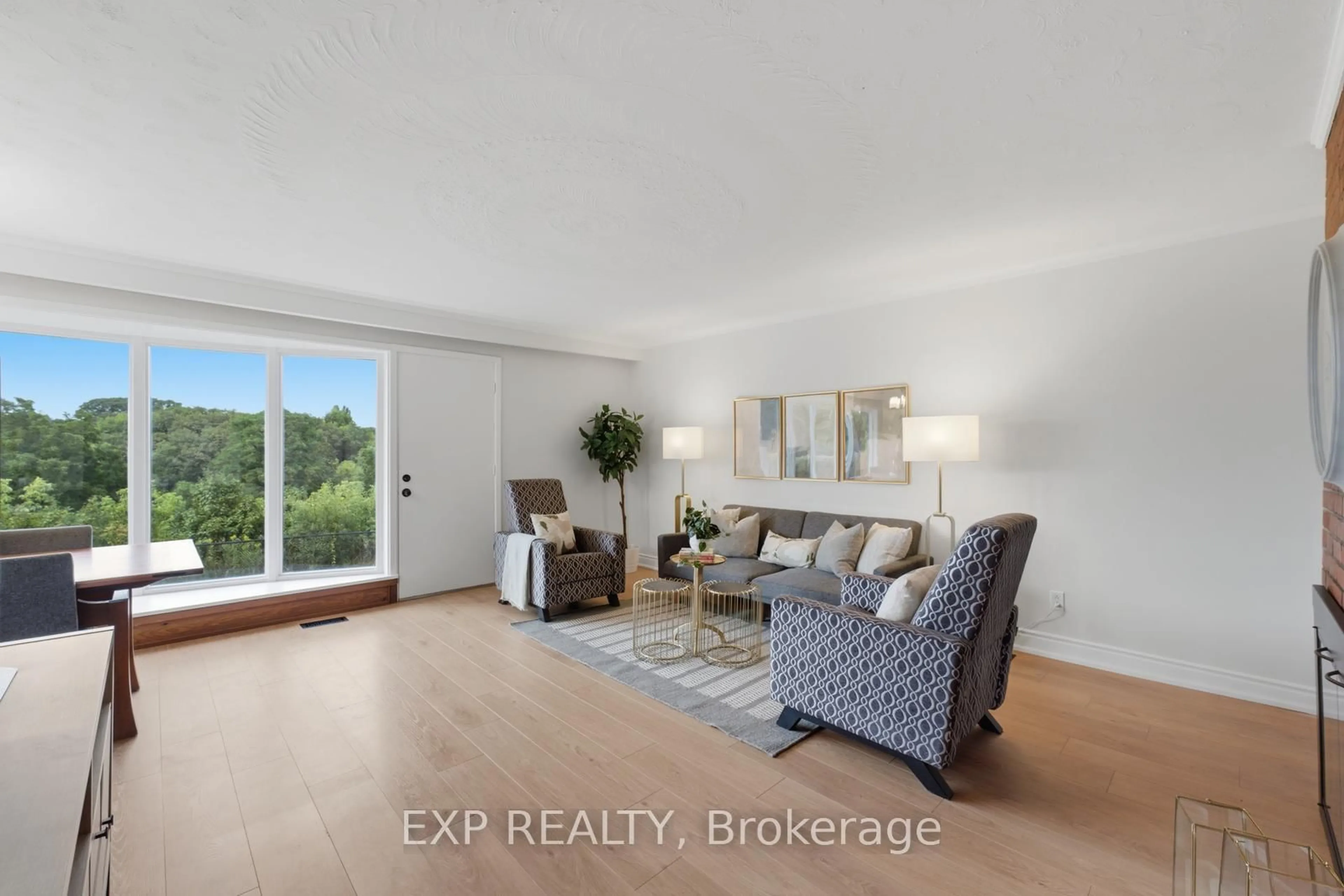 Living room with furniture, unknown for 57 Riverhead Dr, Toronto Ontario M9W 4G3