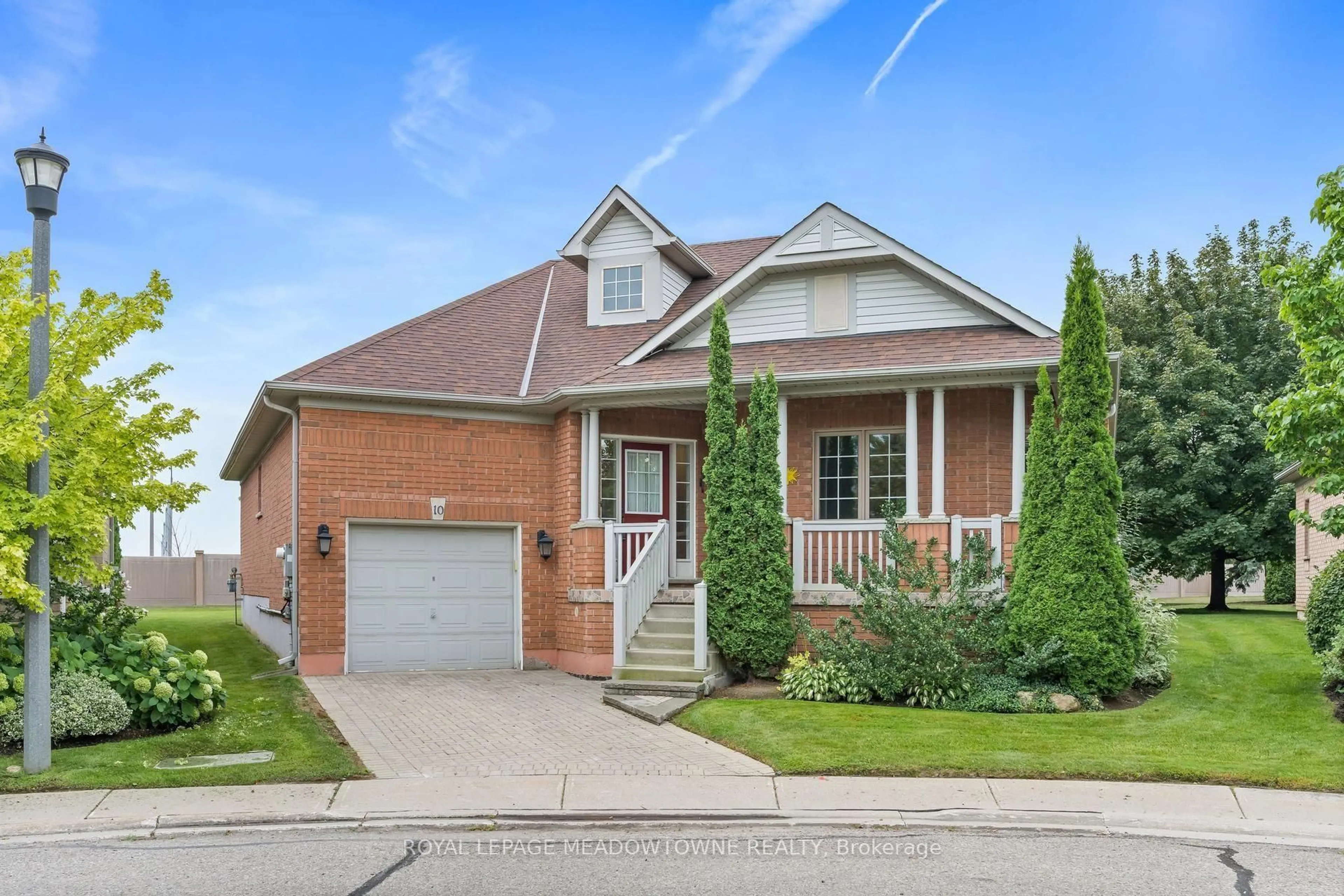 Home with brick exterior material, street for 10 Orchard Park Gate, Brampton Ontario L6R 1W5