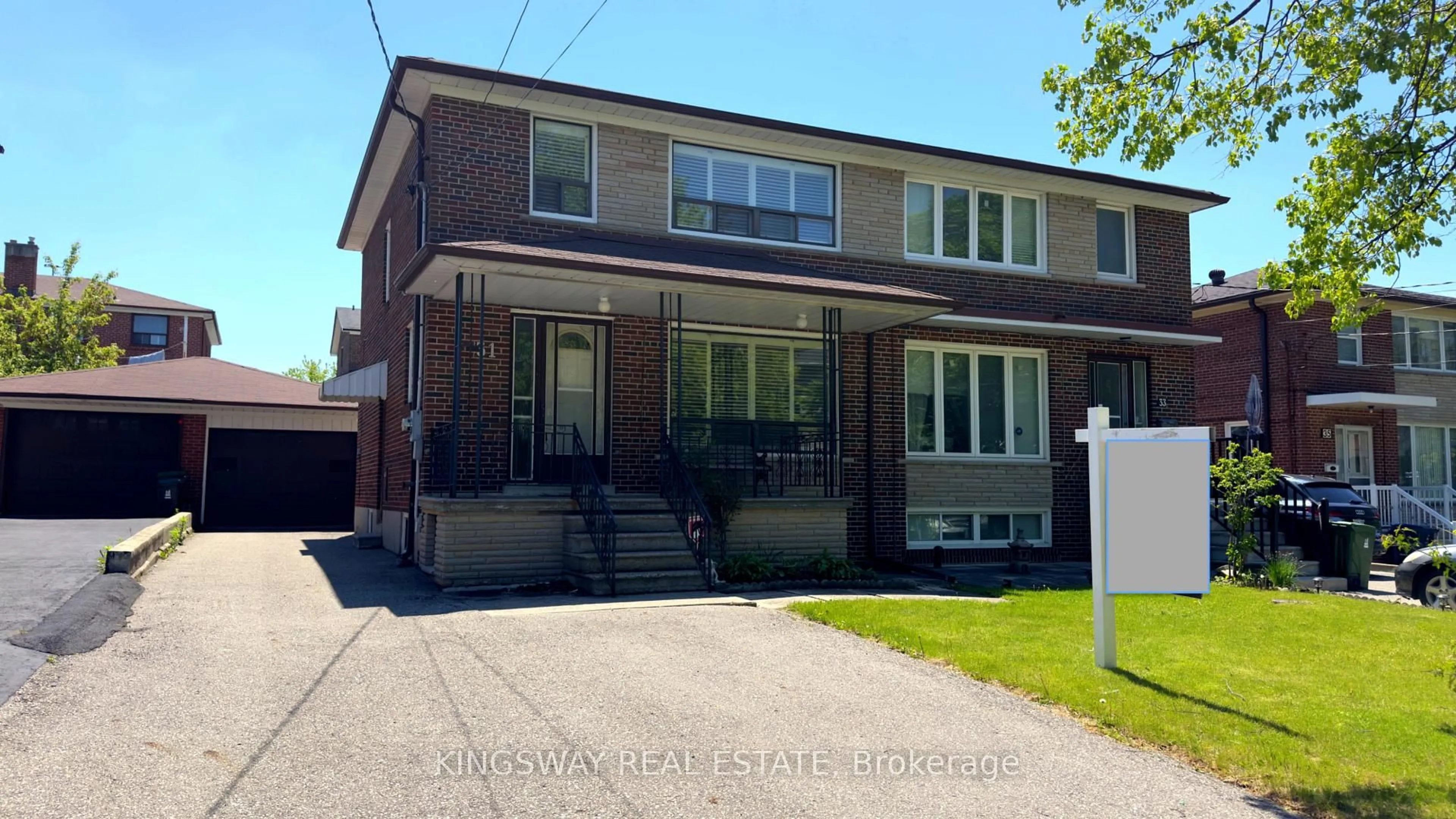 Home with brick exterior material, street for 31 Quinan Dr, Toronto Ontario M6L 1E8