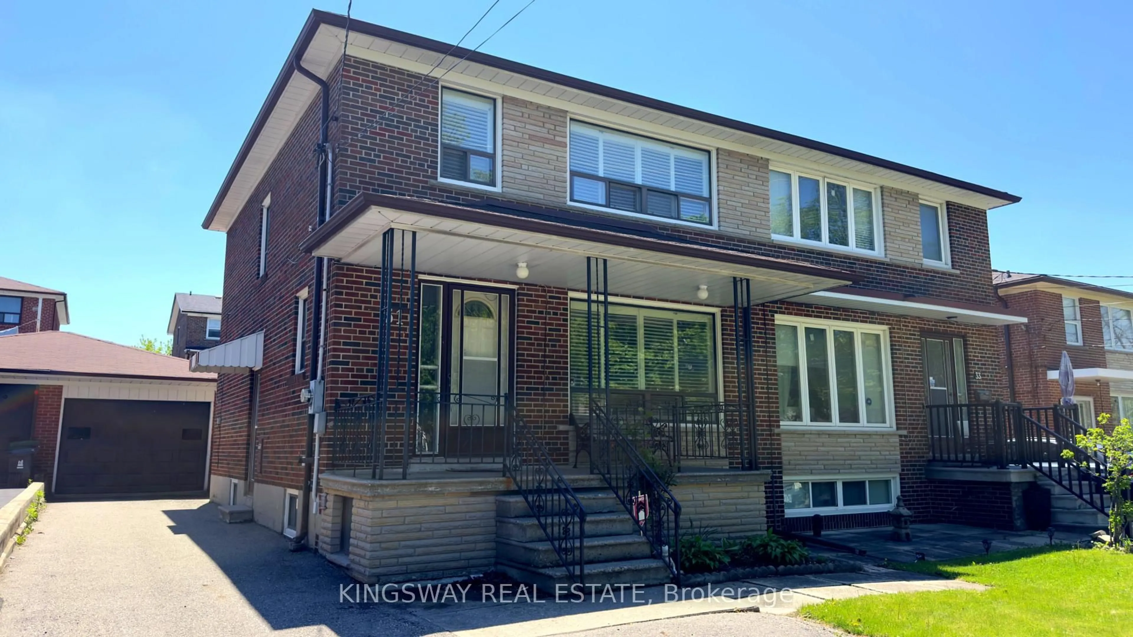 Home with brick exterior material, street for 31 Quinan Dr, Toronto Ontario M6L 1E8
