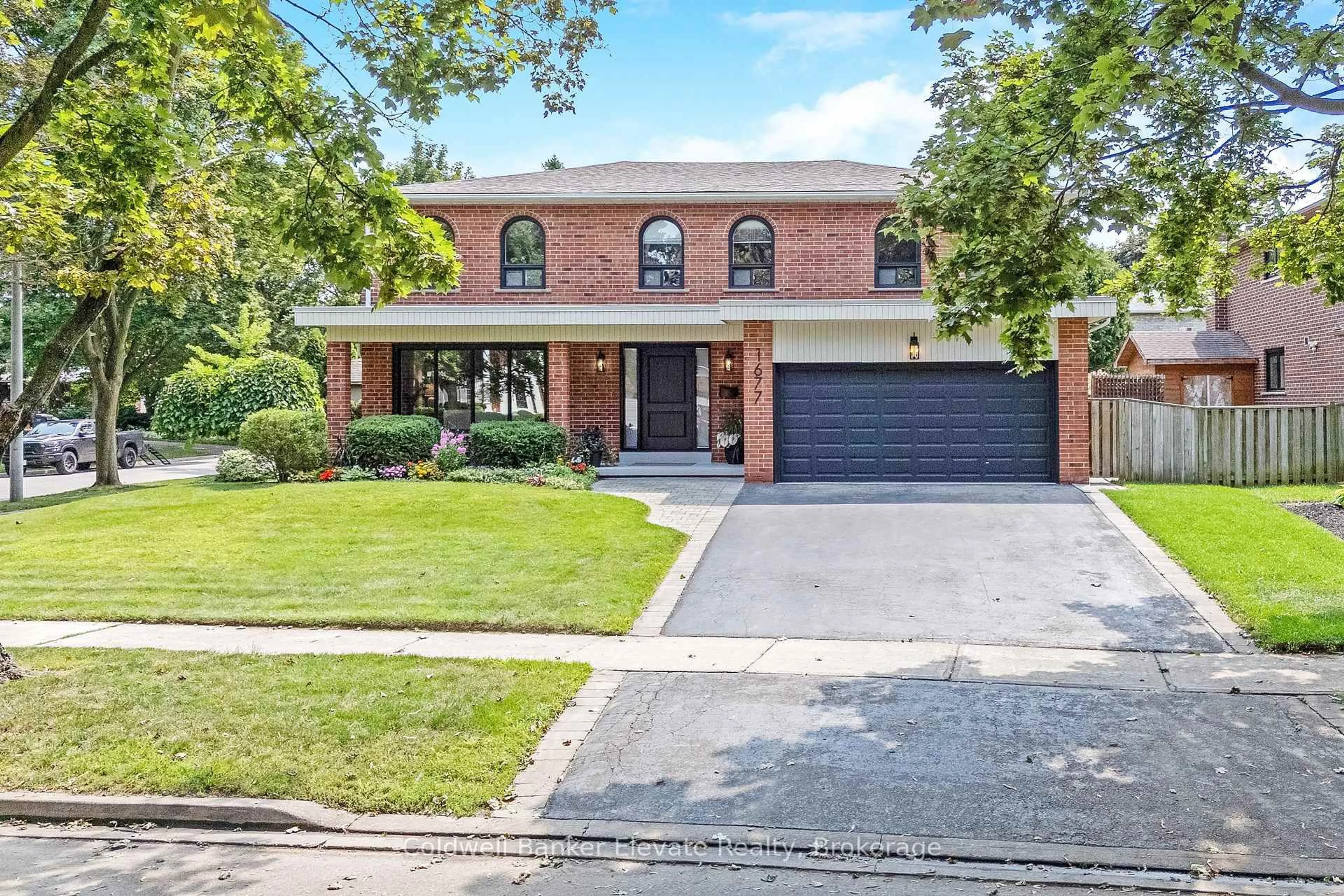 Home with brick exterior material, street for 1677 Sherwood Forrest Circ, Mississauga Ontario L5K 2G8