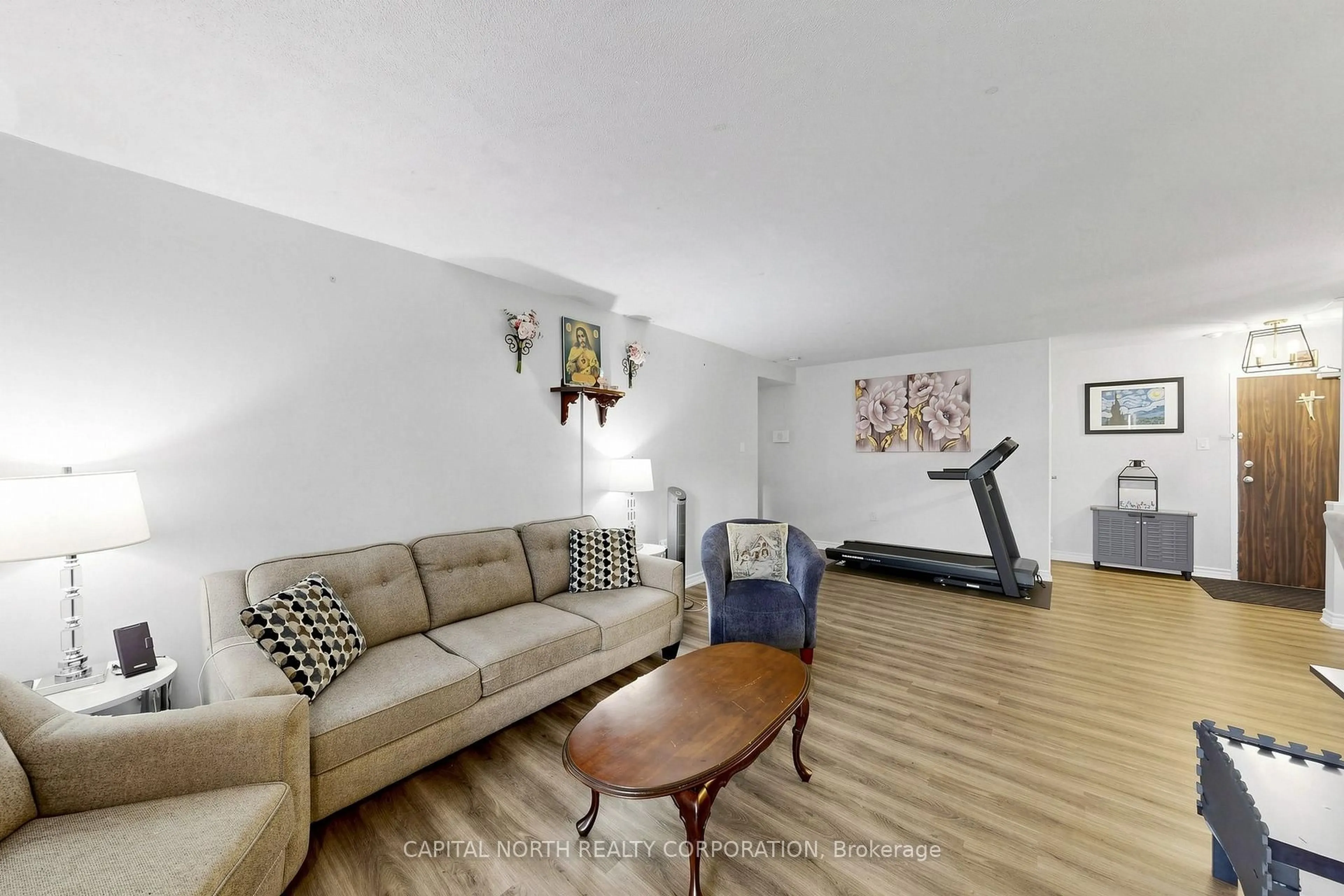 Living room with furniture, unknown for 21 Knightsbridge Rd #1502, Brampton Ontario L6T 3Y1