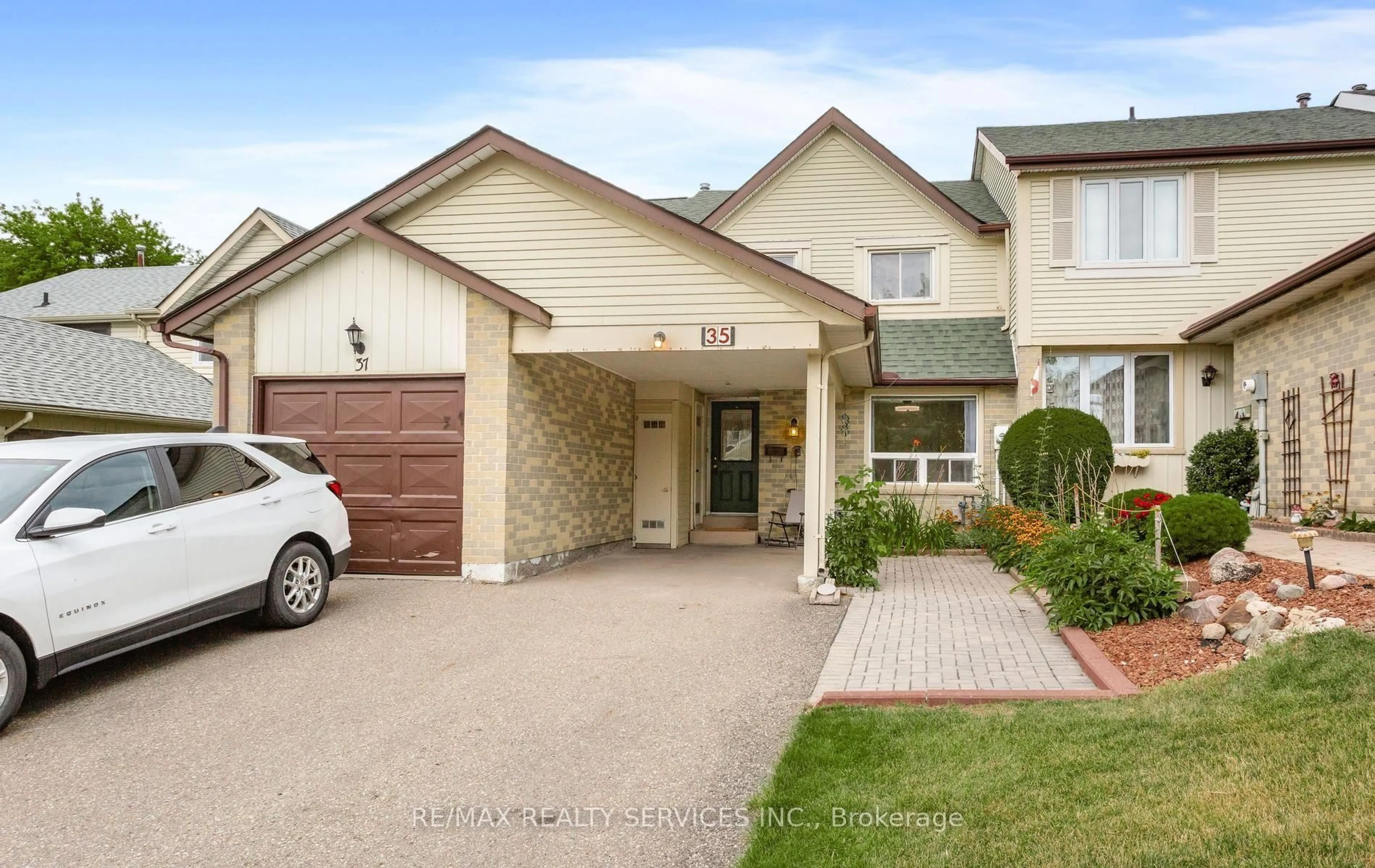 Home with brick exterior material, street for 35 Sparklett Cres, Brampton Ontario L6Z 1M7