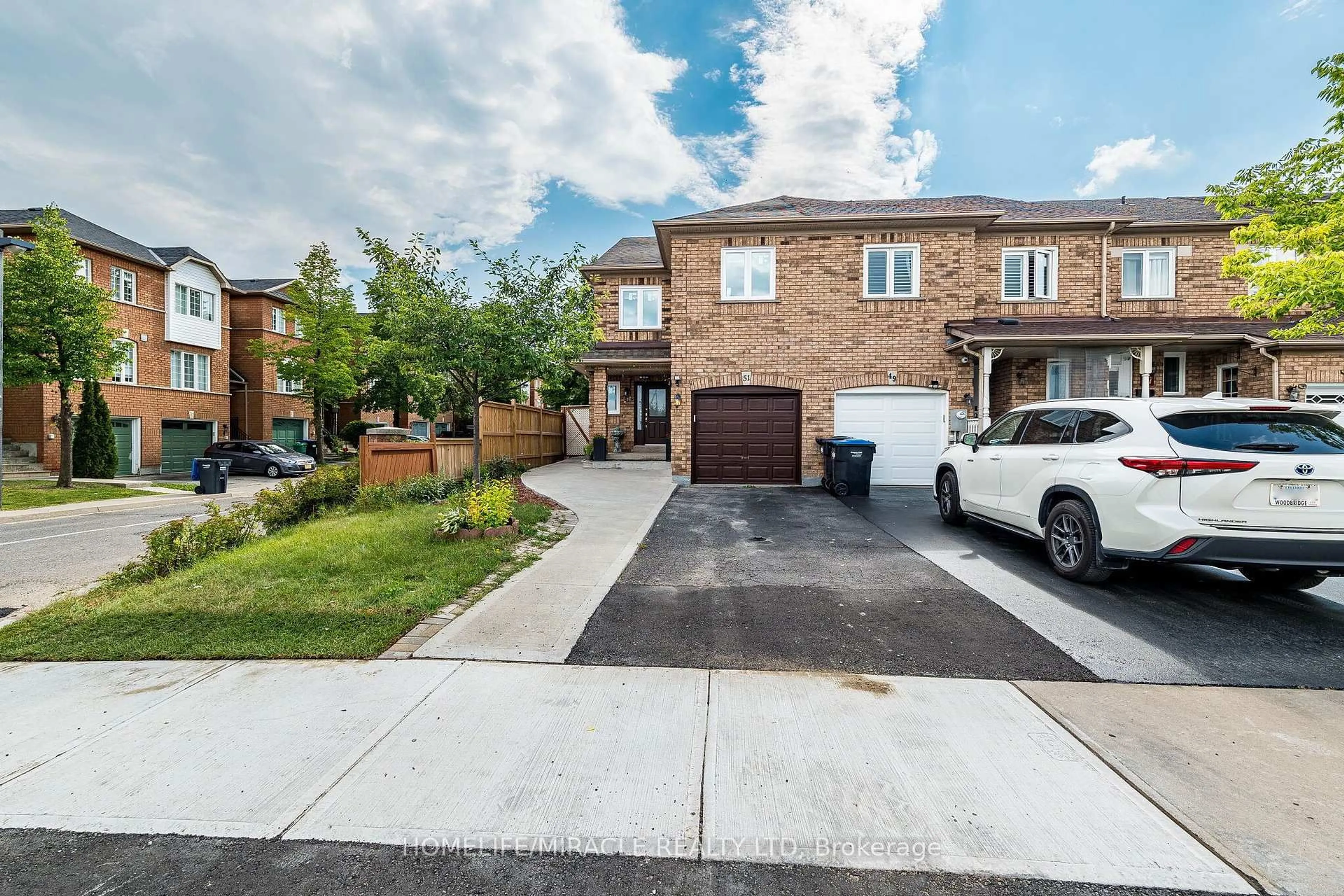 A pic from outside/outdoor area/front of a property/back of a property/a pic from drone, street for 51 Brickyard Way, Brampton Ontario L6V 4L6