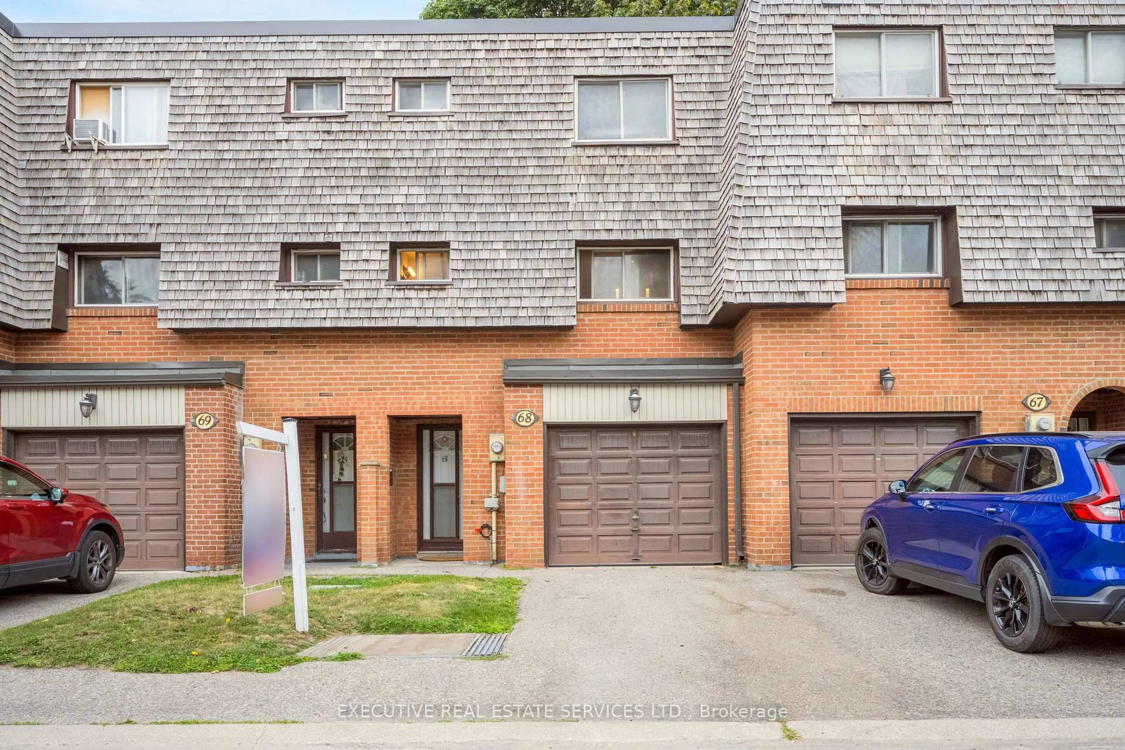 Home with brick exterior material, street for 68 Briar Path, Brampton Ontario L6T 2A3