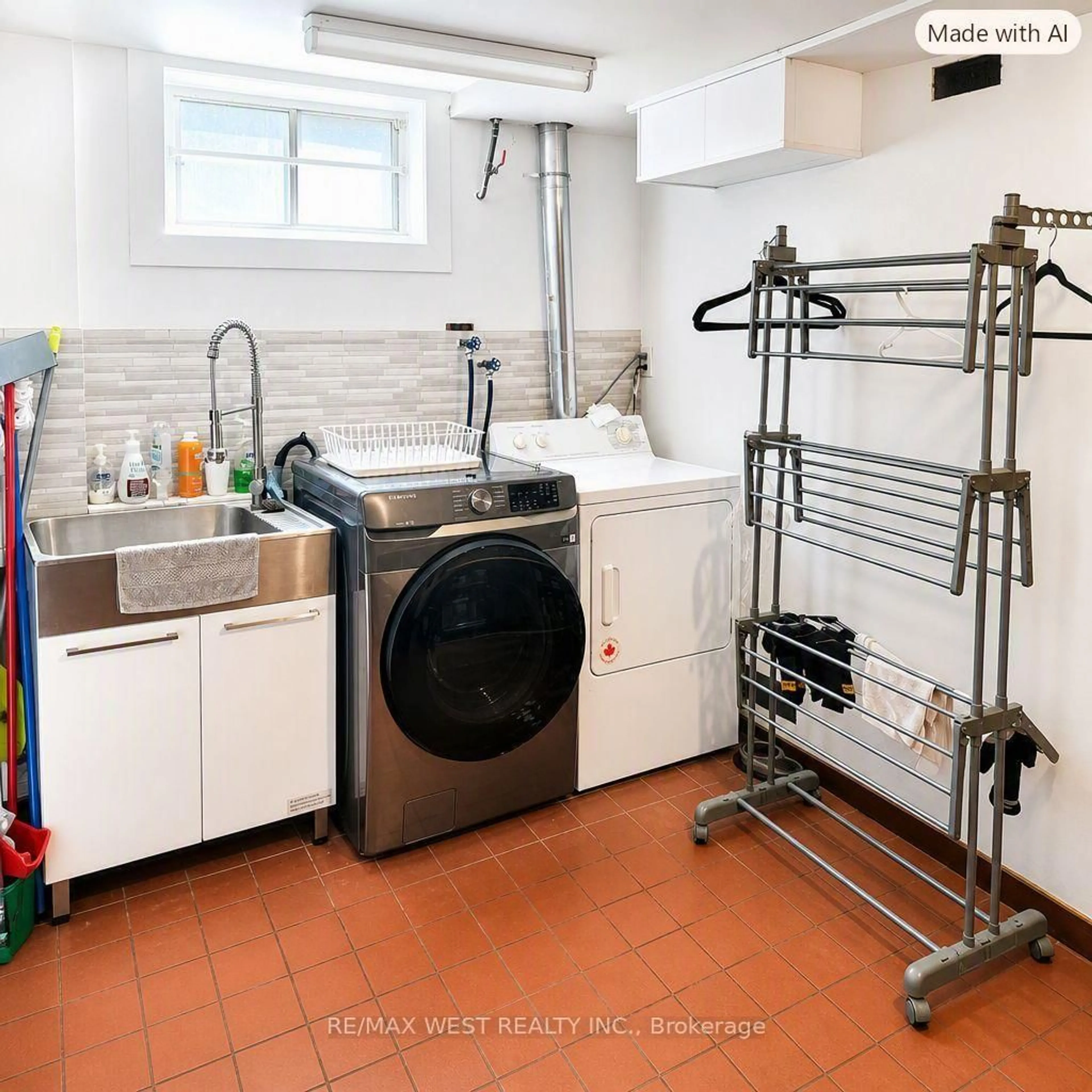 Kitchen with laundary machines, ceramic/tile floor for 65 Ridge Point Cres, Toronto Ontario M6M 2Z7