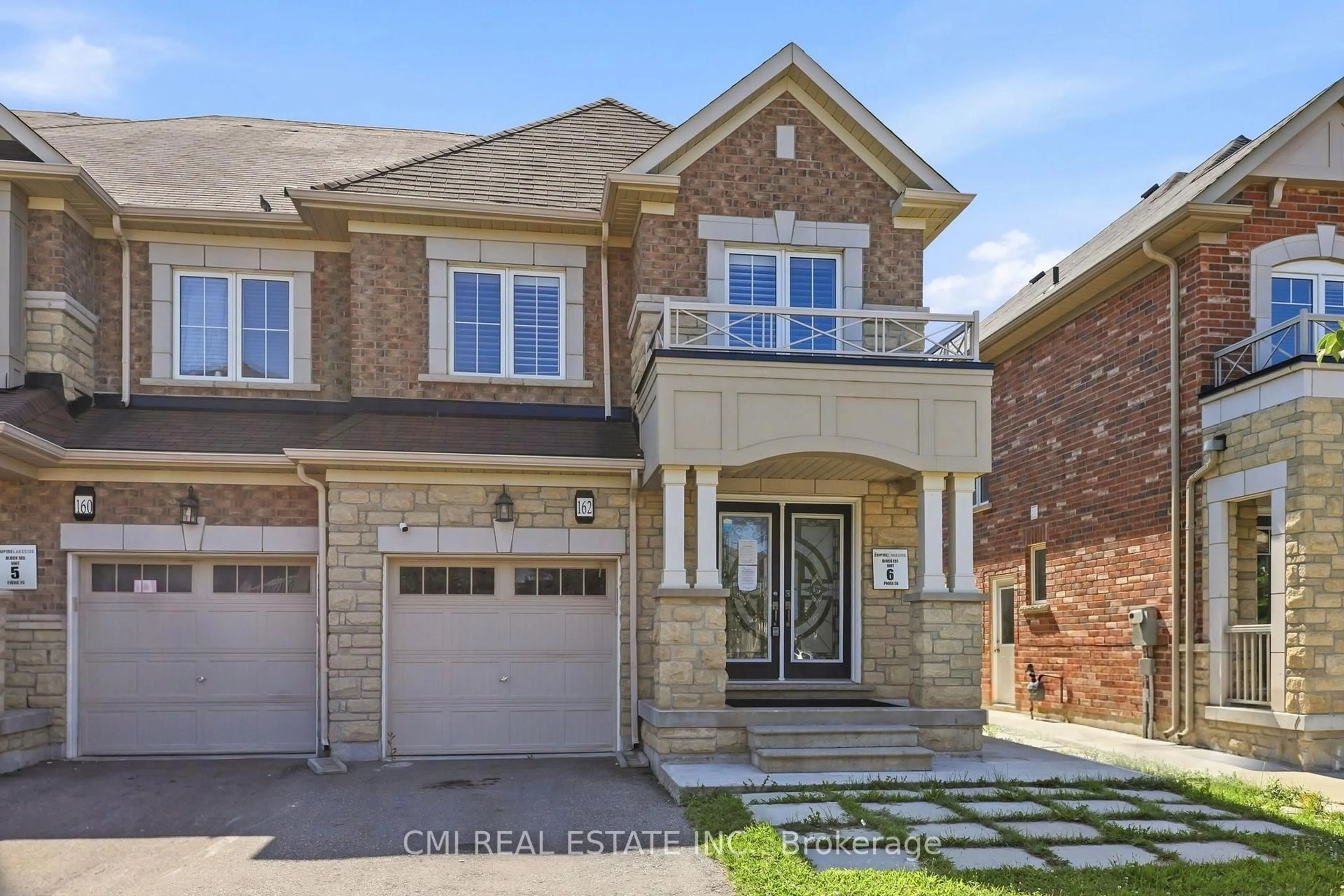 Home with brick exterior material, street for 162 Golden Springs Dr, Brampton Ontario L7A 4N9