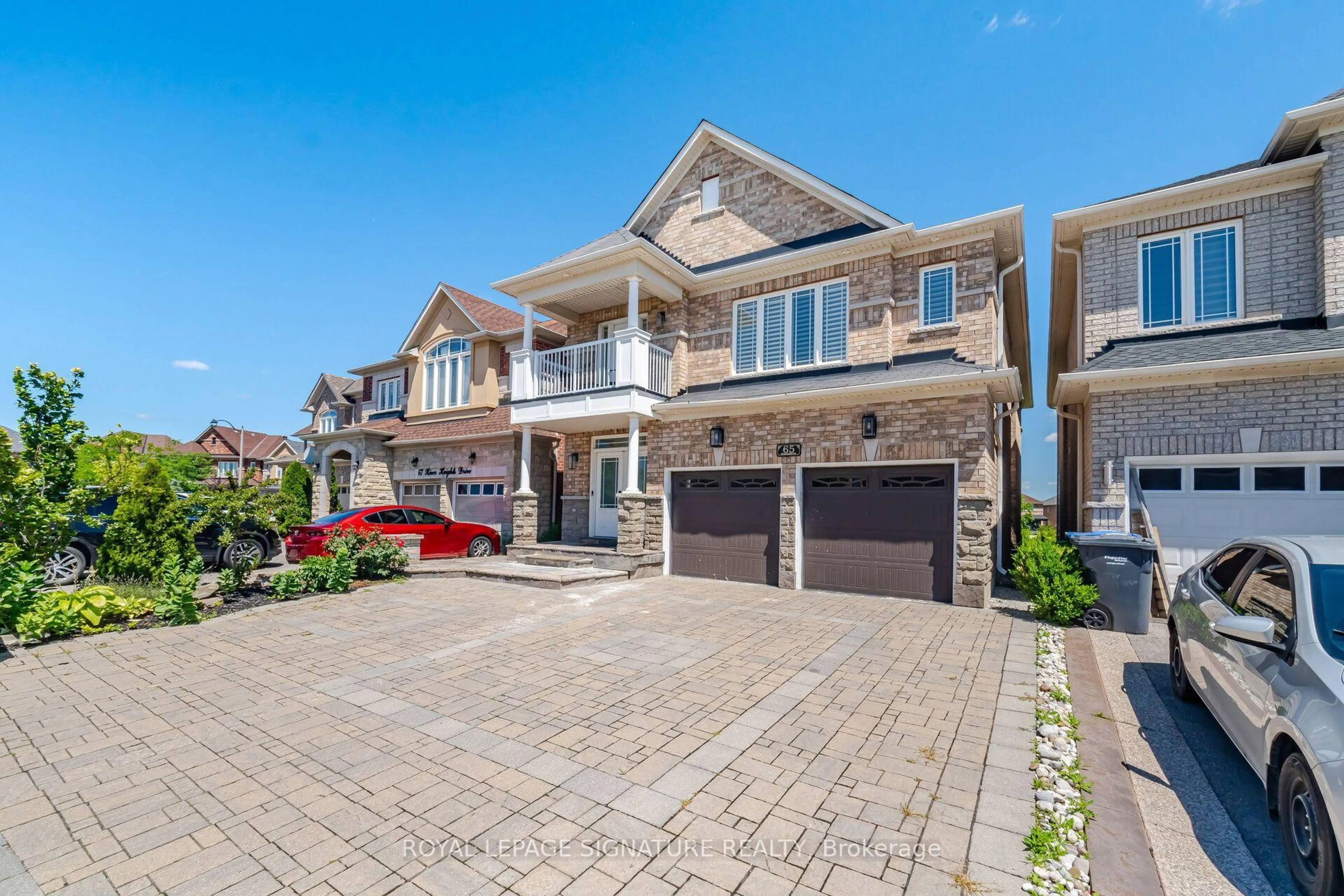 Home with brick exterior material, street for 65 River Heights Dr, Brampton Ontario L6P 3B7