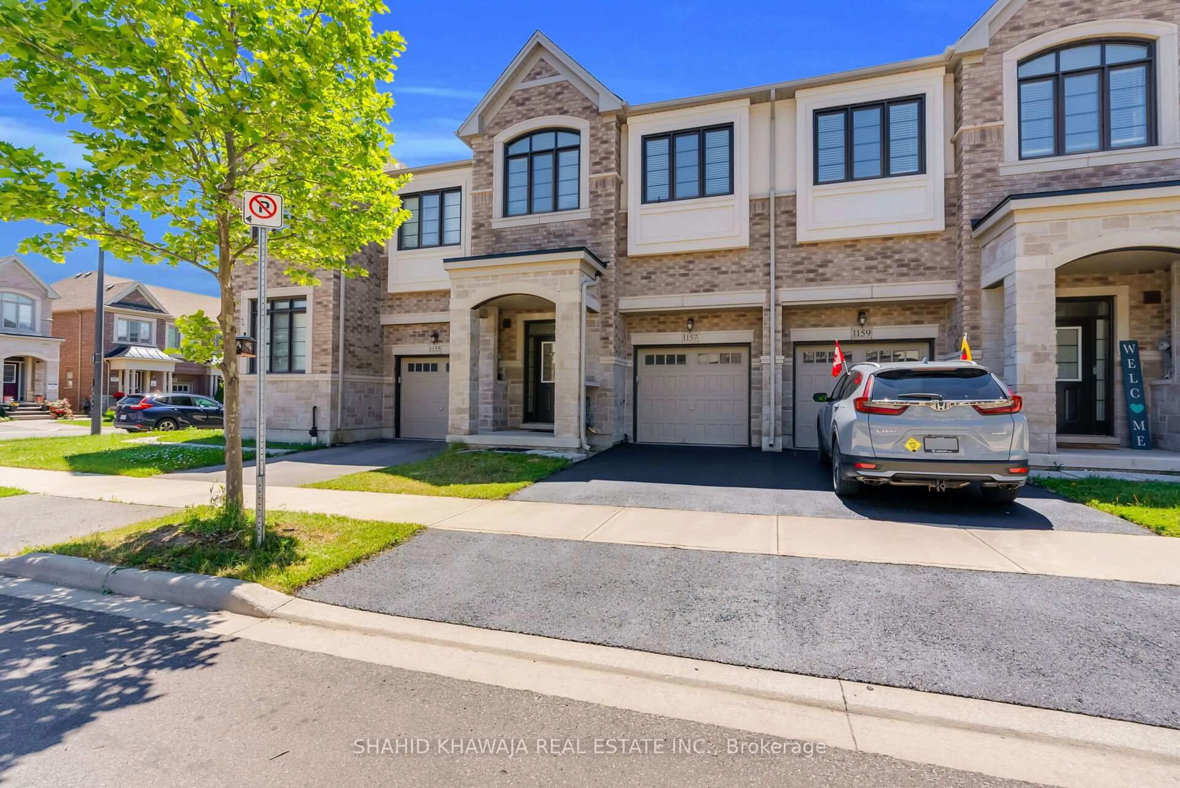 Home with brick exterior material, street for 1157 Restivo Lane, Milton Ontario L9T 2X5