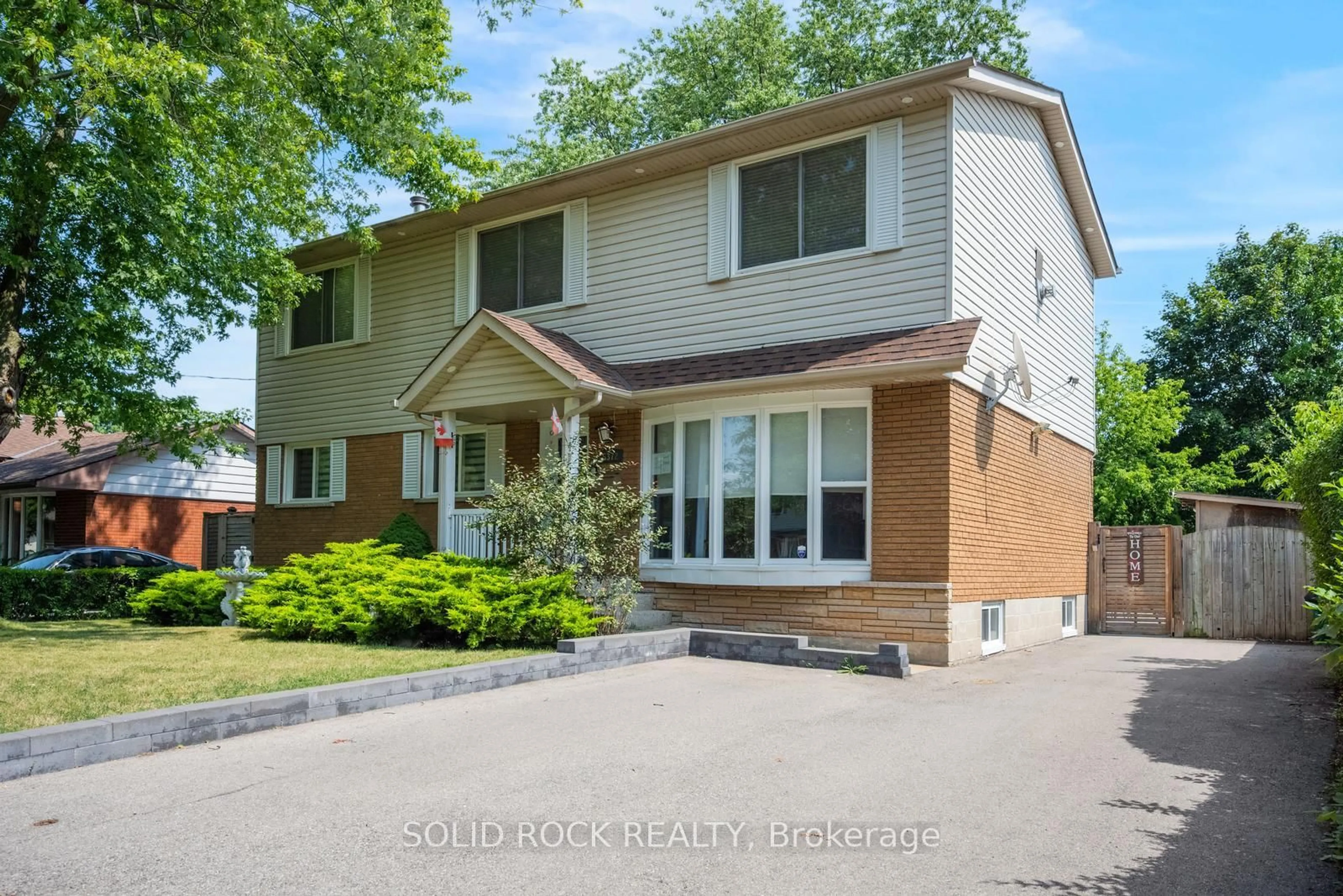 Home with brick exterior material, street for 5372 Spruce Ave, Burlington Ontario L7L 1N7