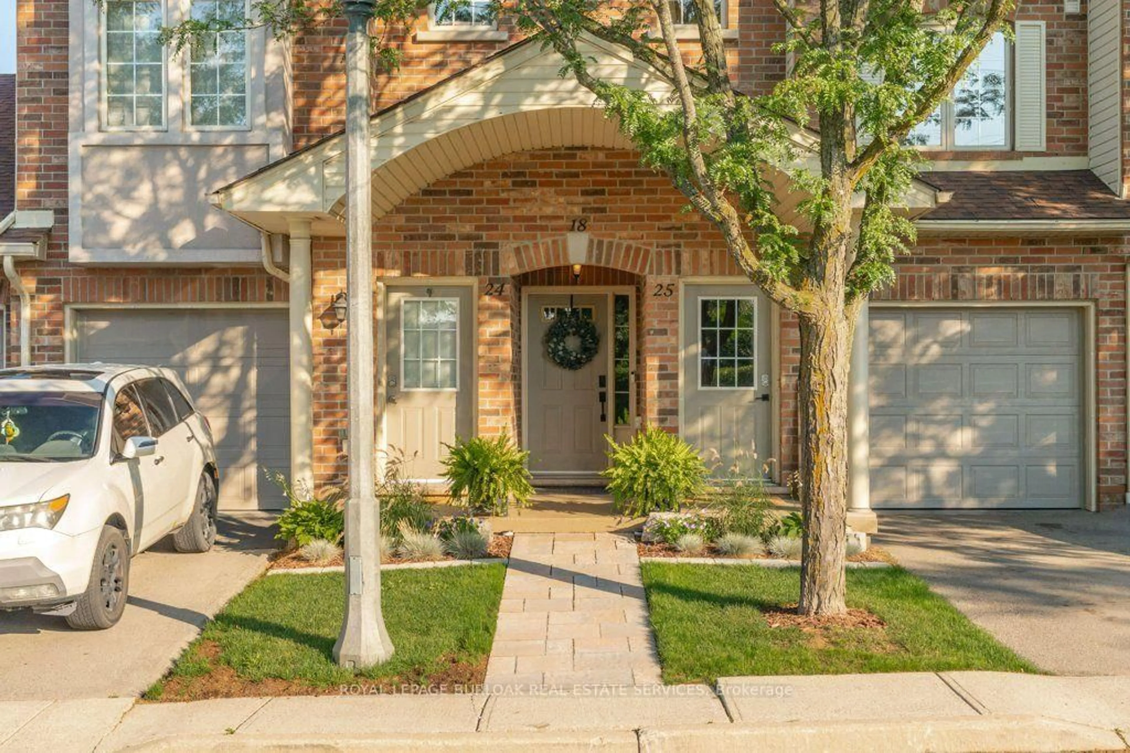 Home with brick exterior material, street for 4045 Upper Middle Rd #25, Burlington Ontario L7M 4S8