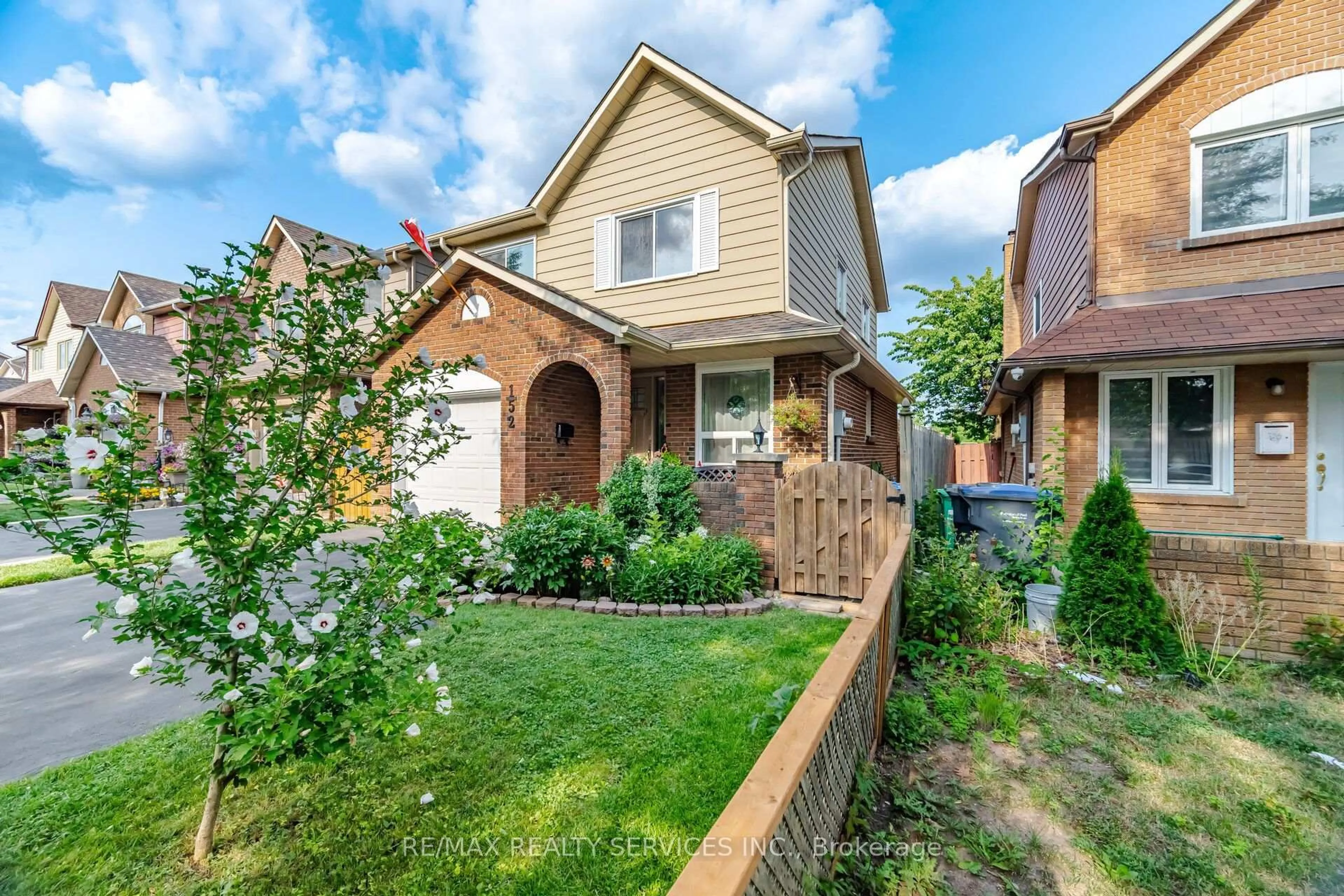 Home with brick exterior material, street for 152 Weybridge Tr, Brampton Ontario L6V 3W2