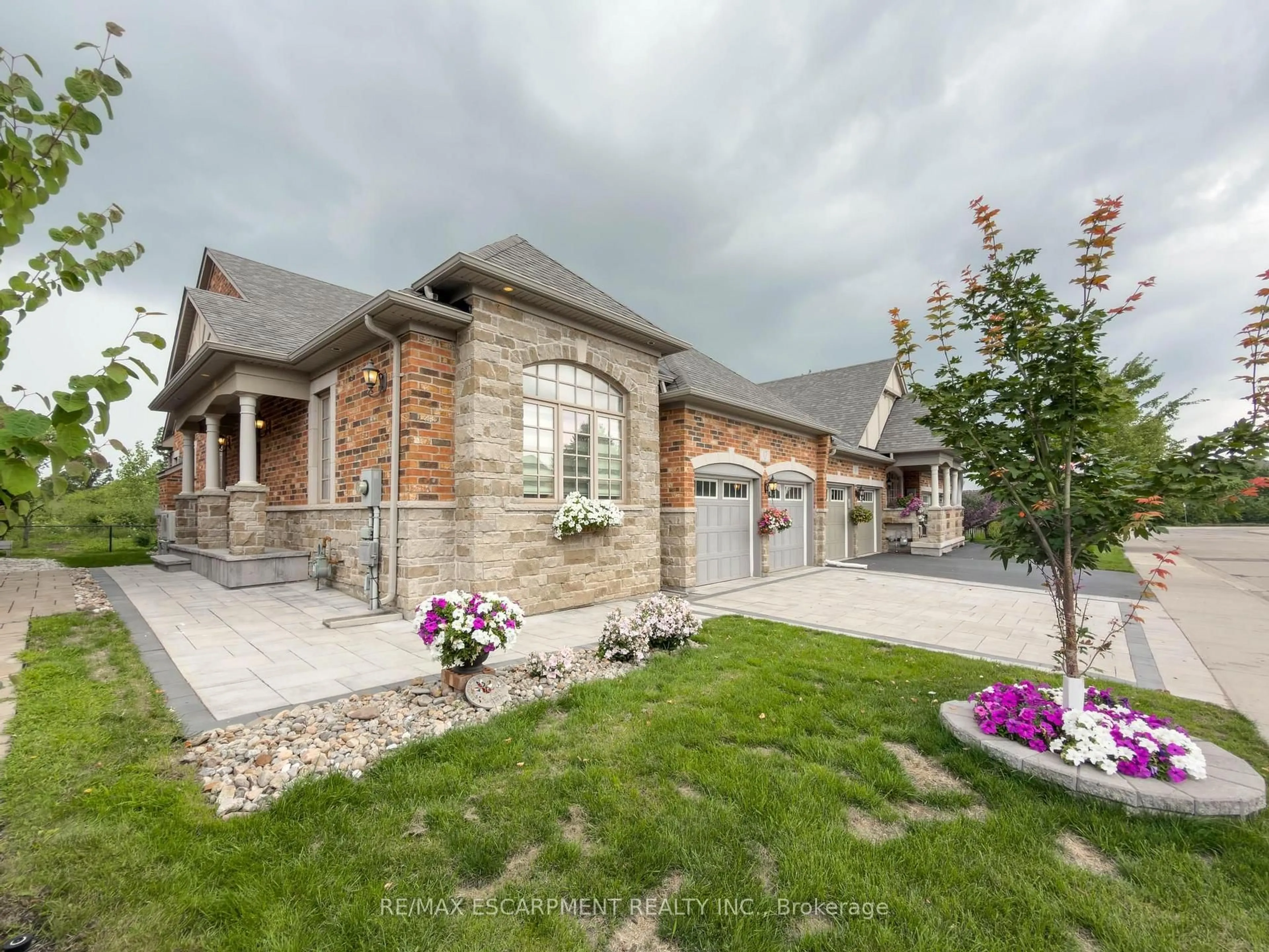Home with brick exterior material, street for 3353 Liptay Ave #17, Oakville Ontario L6M 0M6