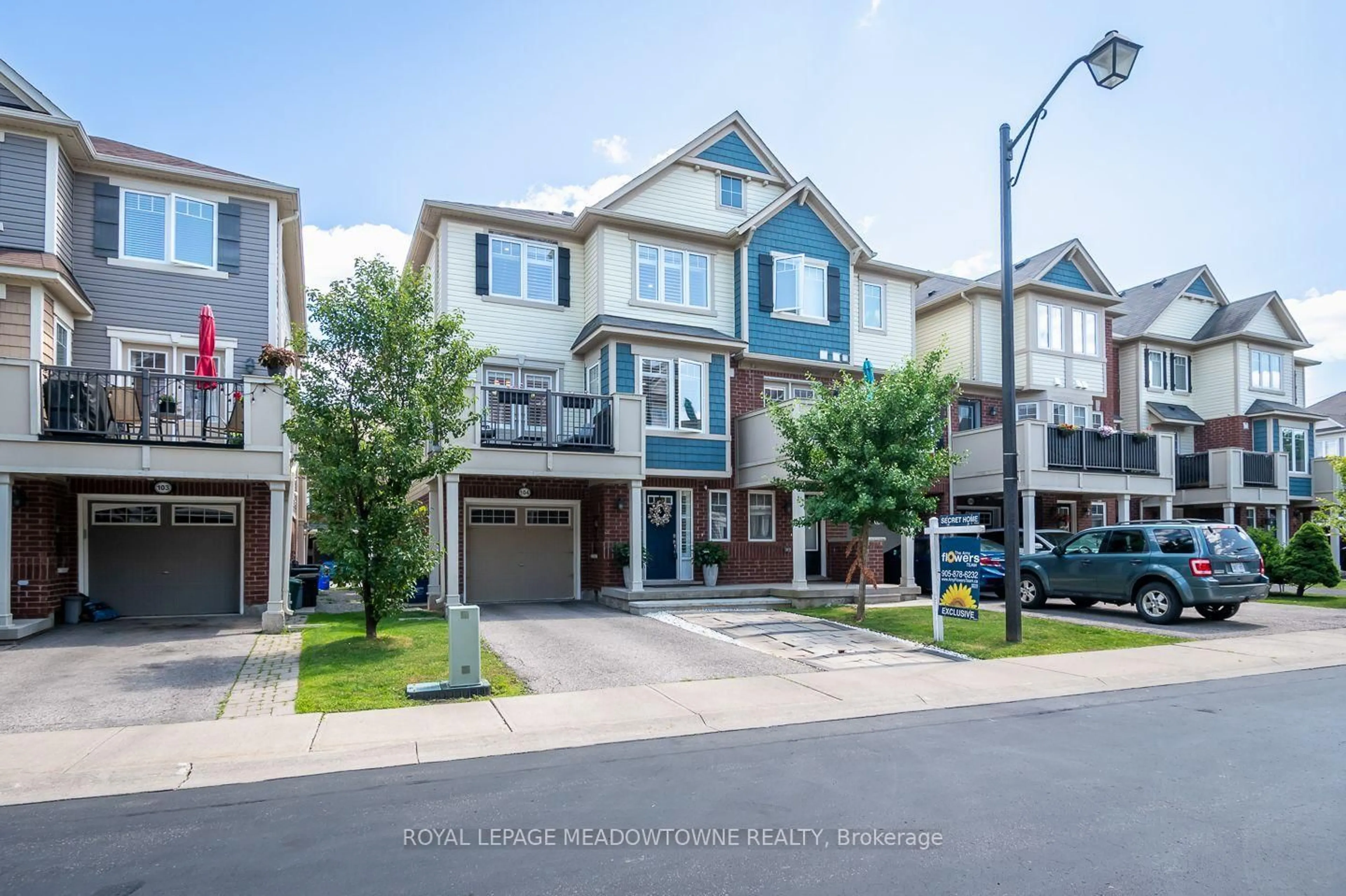 A pic from outside/outdoor area/front of a property/back of a property/a pic from drone, street for 6020 Derry Rd #104, Milton Ontario L9T 8J5