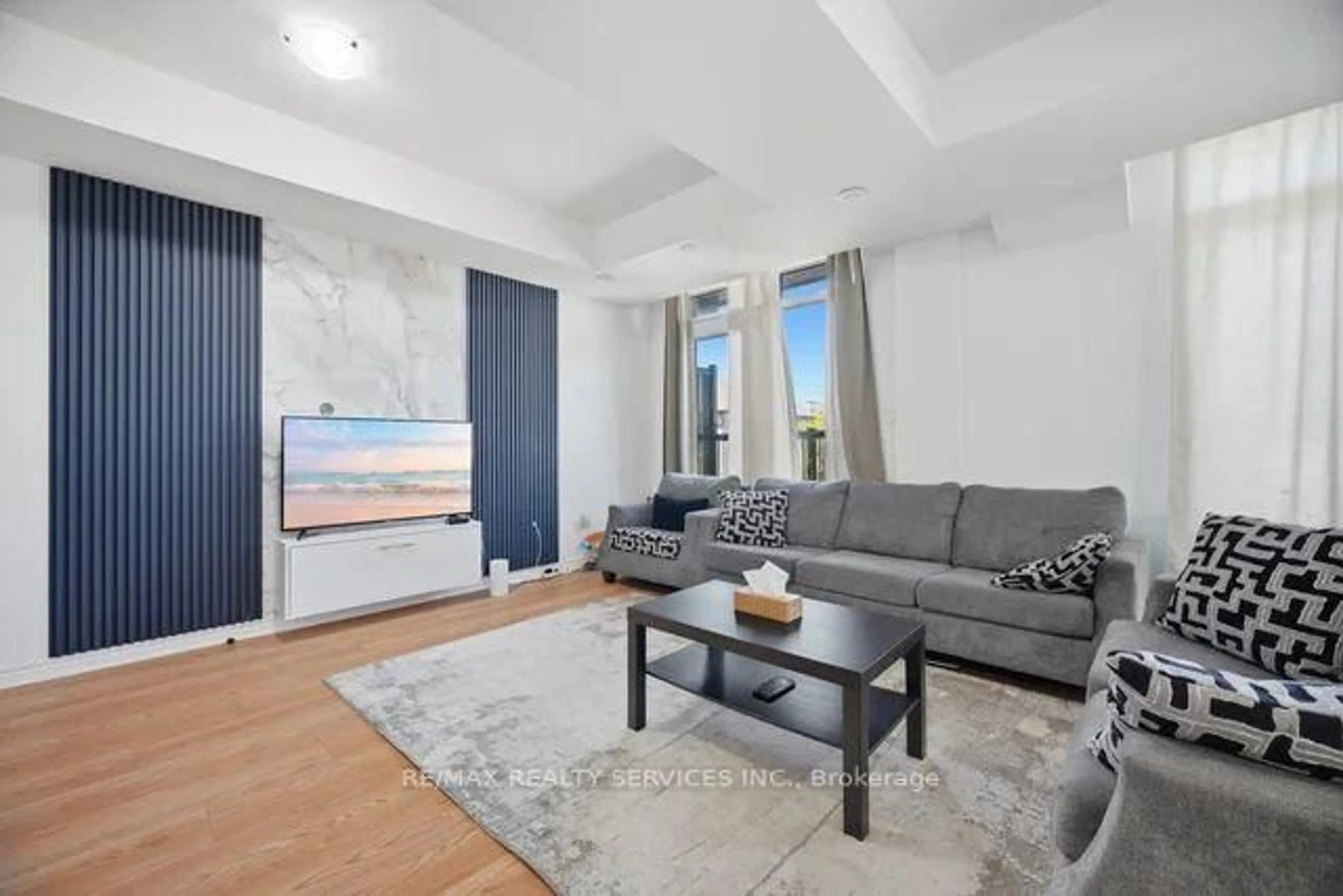 Living room with furniture, unknown for 417 Dougall Ave #14, Caledon Ontario L7C 4L5