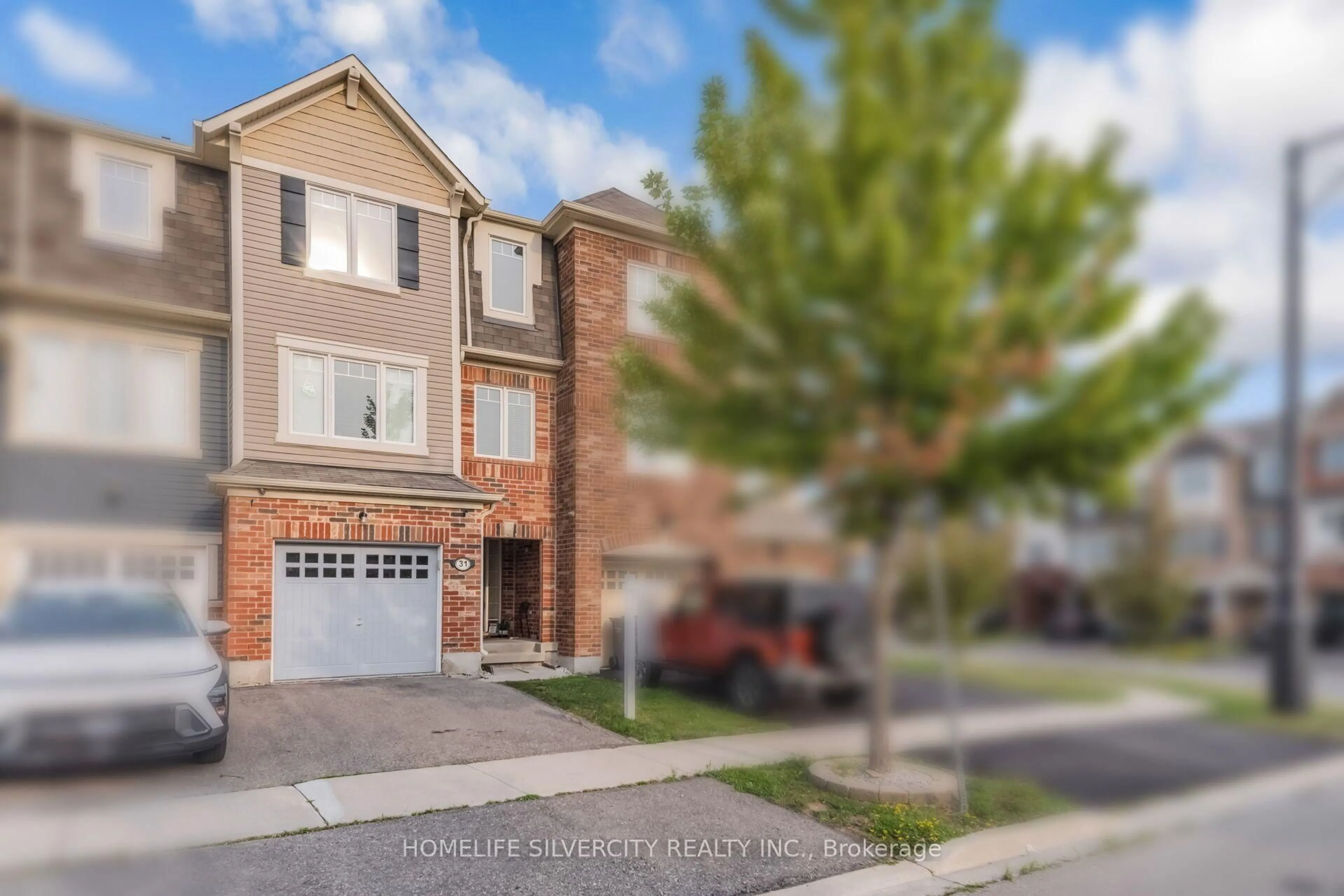 Home with brick exterior material, street for 31 Betterton Cres, Brampton Ontario L7A 0S5