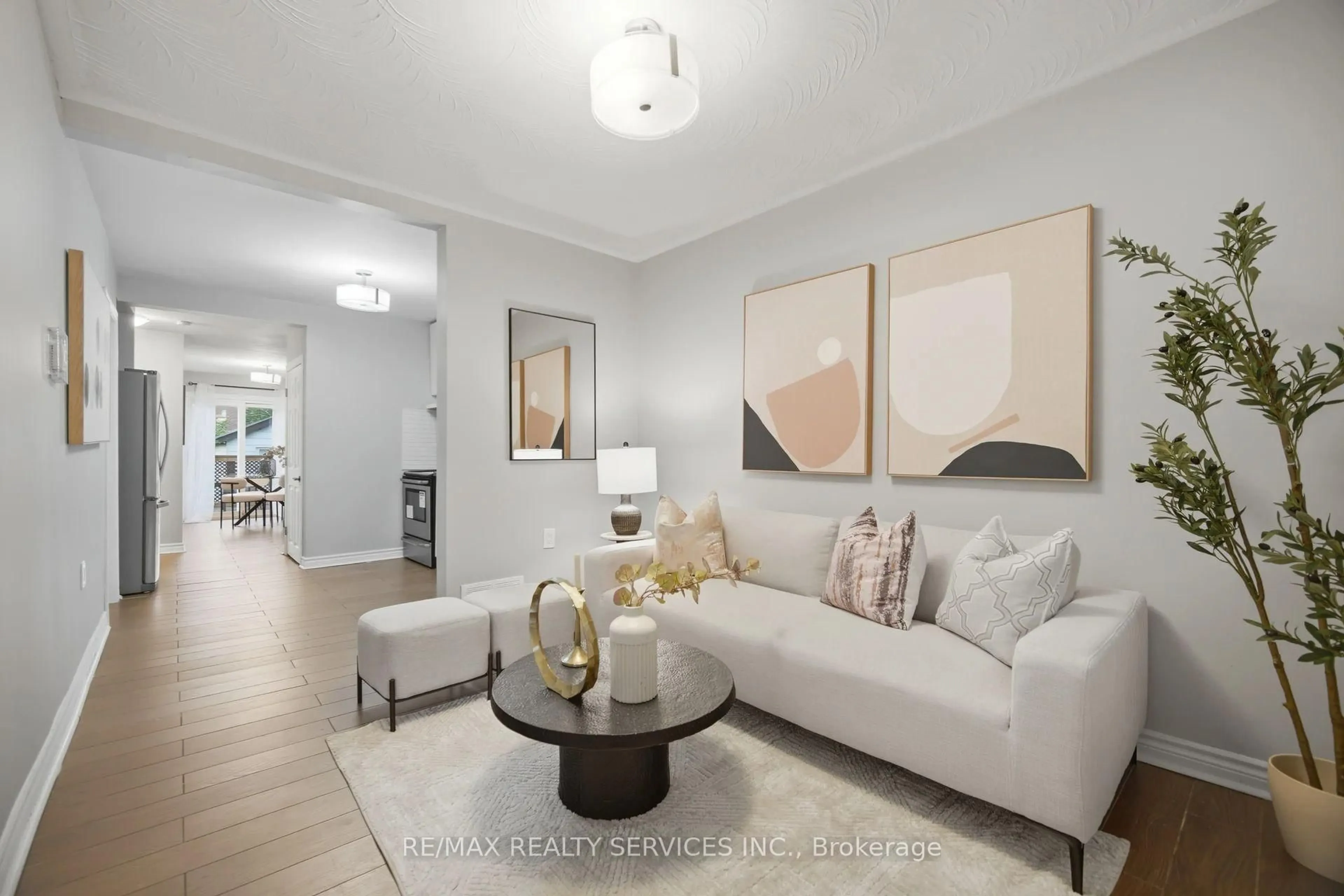 Living room with furniture, ceramic/tile floor for 30 Elder Ave, Toronto Ontario M8W 1S4