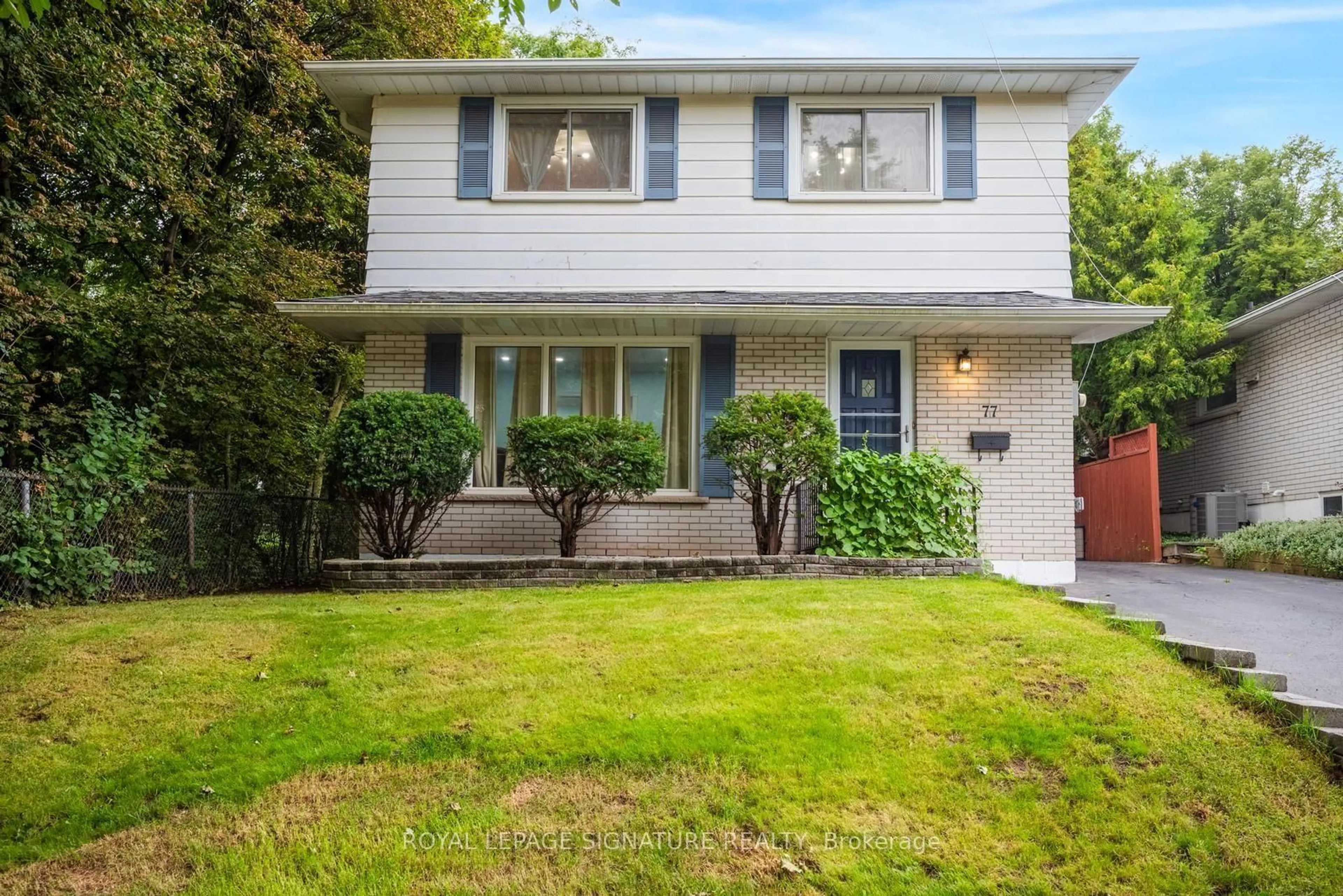 Home with vinyl exterior material, street for 77 McCraney St, Oakville Ontario L6H 1H5