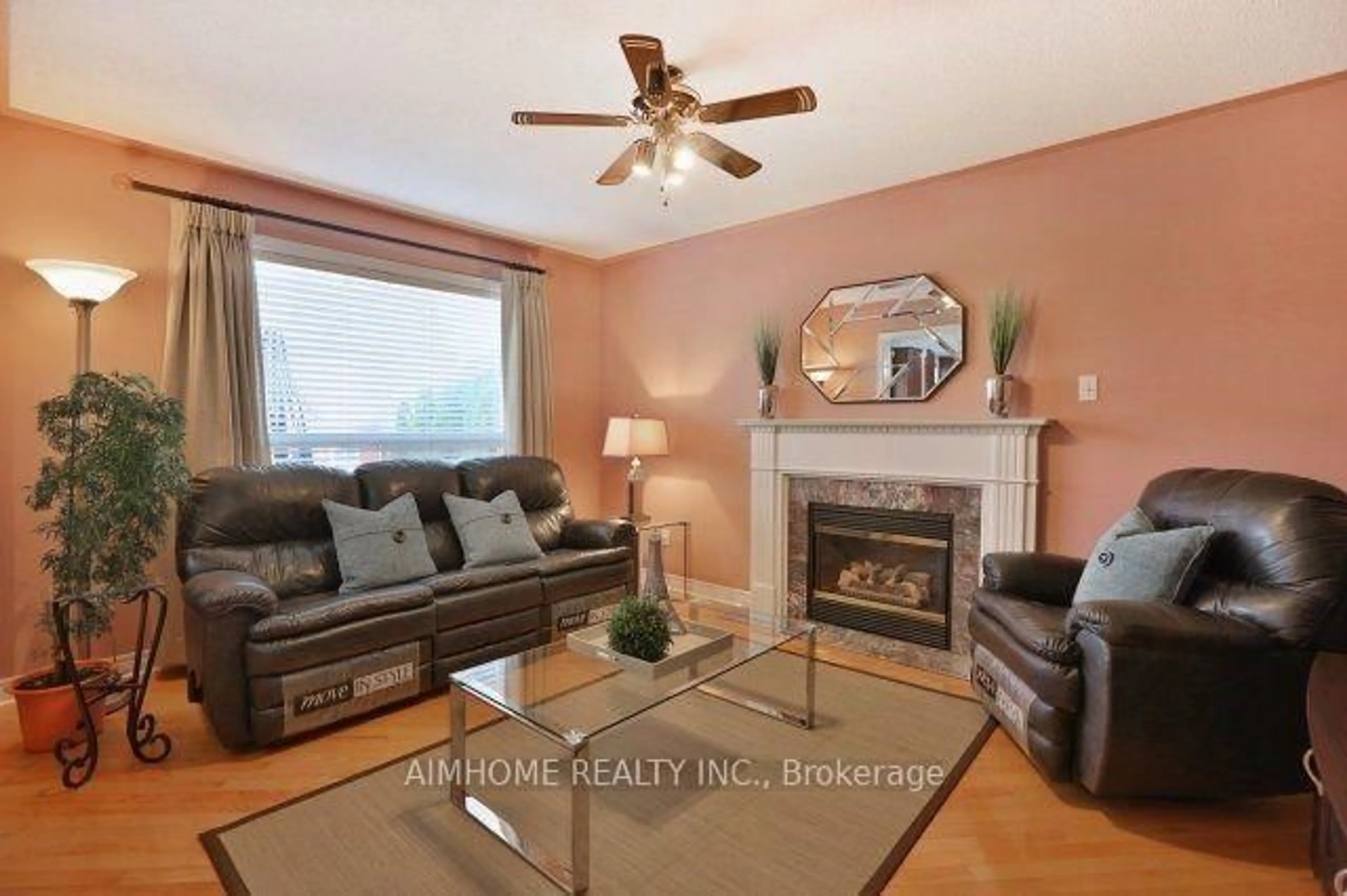 Living room with furniture, wood/laminate floor for 390 Grovehill Rd, Oakville Ontario L6H 6P3
