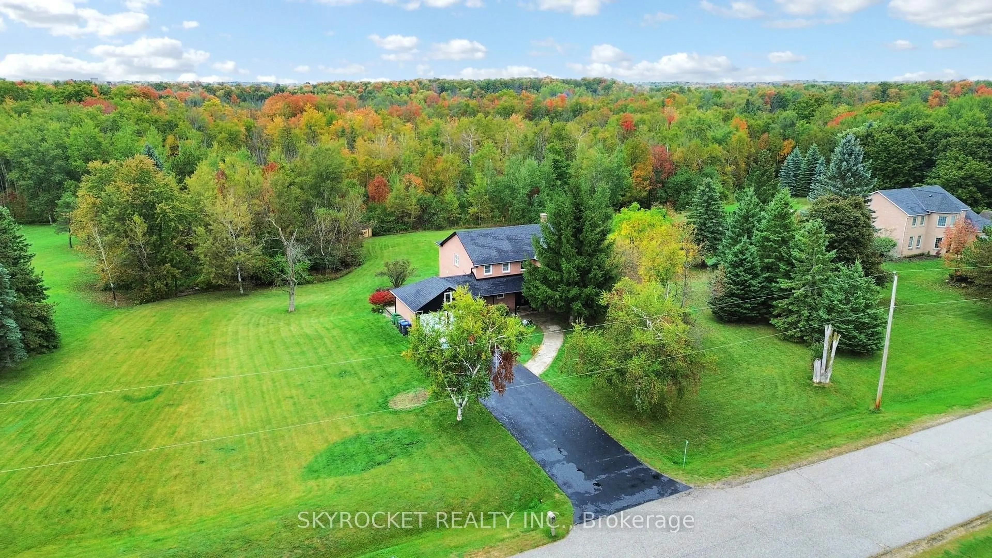 A pic from outside/outdoor area/front of a property/back of a property/a pic from drone, water/lake/river/ocean view for 41 Elite Rd, Caledon Ontario L7K 0L2