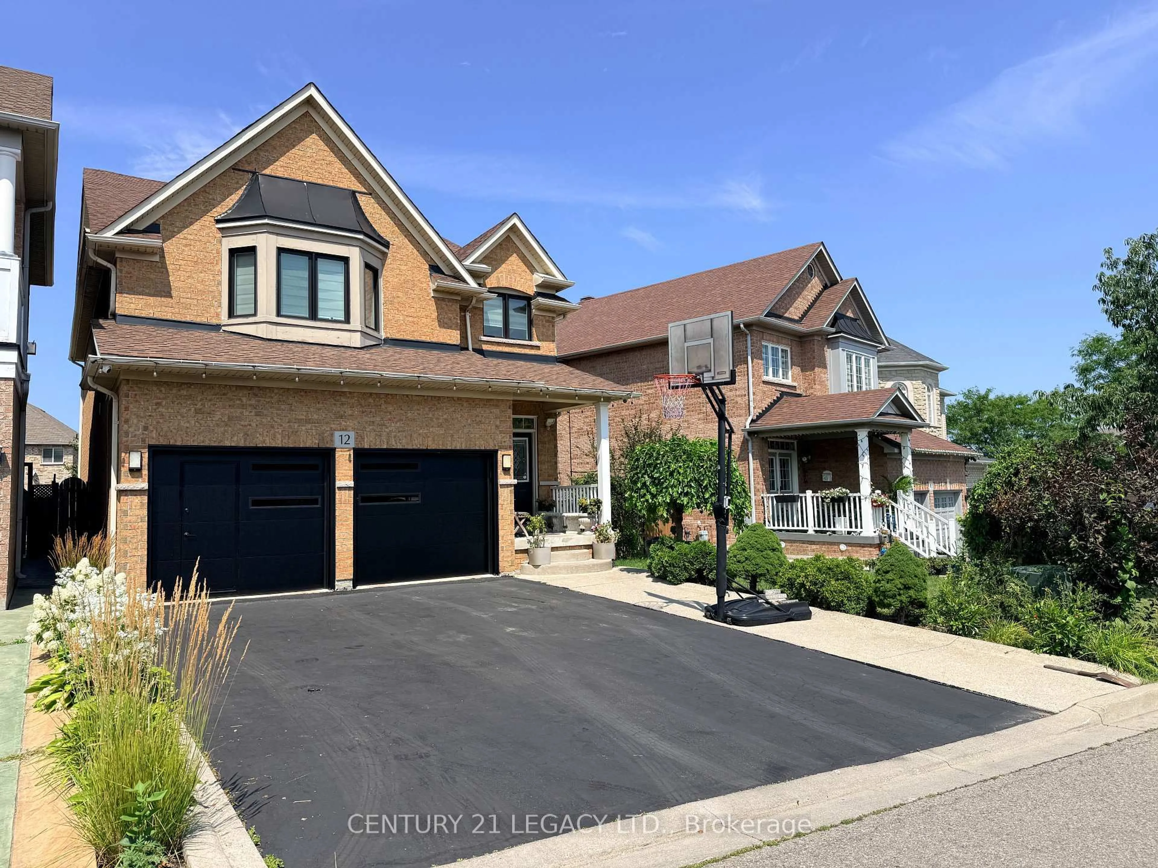 Home with brick exterior material, street for 12 Aria Lane, Brampton Ontario L6S 6J5