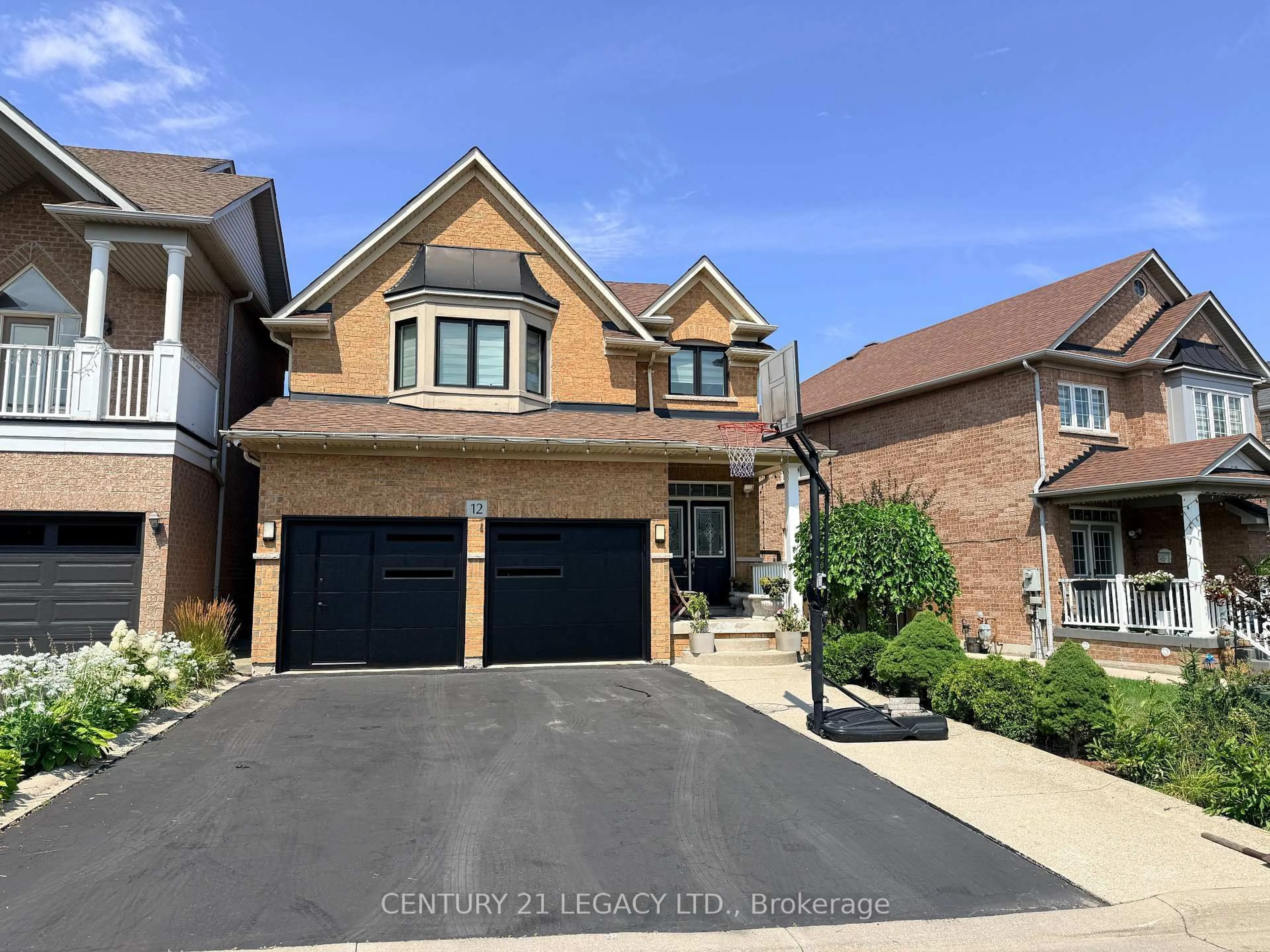 Home with brick exterior material, street for 12 Aria Lane, Brampton Ontario L6S 6J5